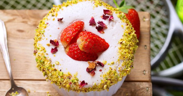 Strawberry souffle? with a crunchy pistachio topping