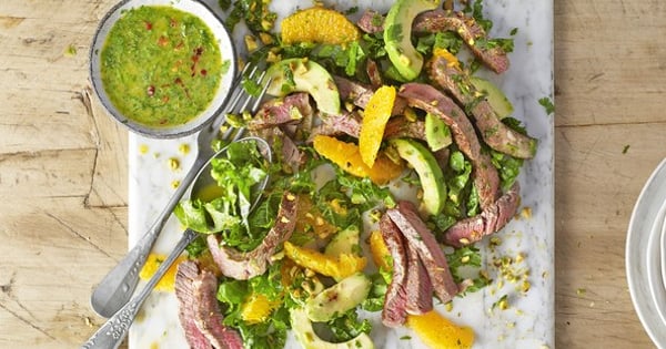 Steak and kale salad with orange, avocado and chimichurri dressing