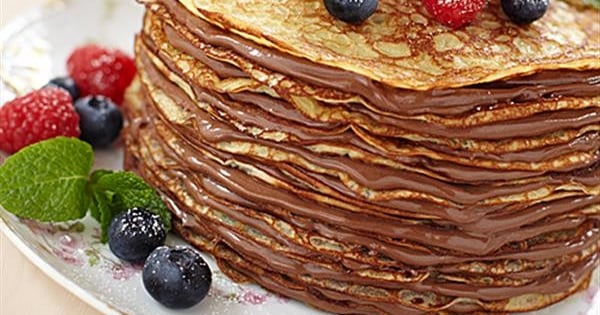 Decadent Chocolate-Peanut Crepe Cake with Berries