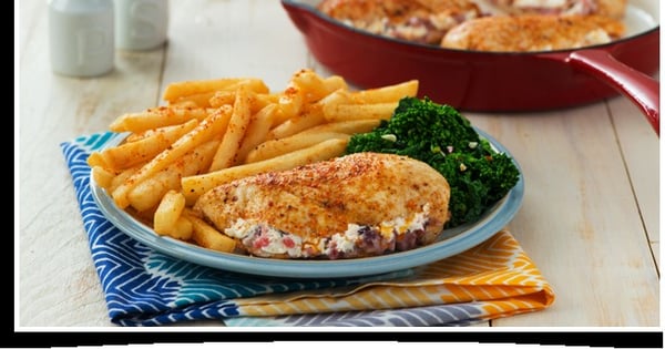 Goat Cheese Stuffed Chicken With Garlic Rapini and Superfries®