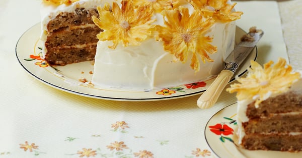 Hummingbird cake topped with pineapple flowers