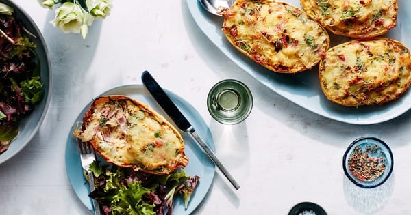 Cheesy Baked Spaghetti Squash Boats with Salami, Sun-Dried Tomatoes, and Spinach
