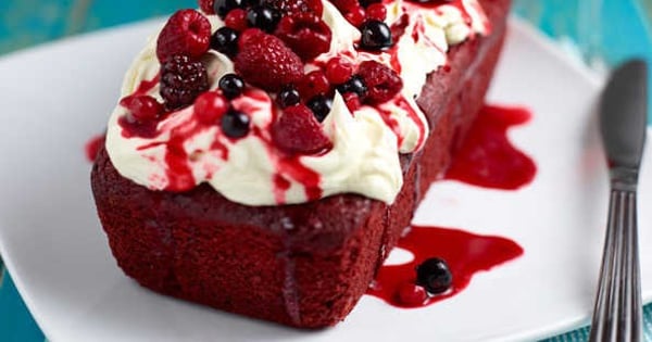 Red velvet loaf with berry frosting
