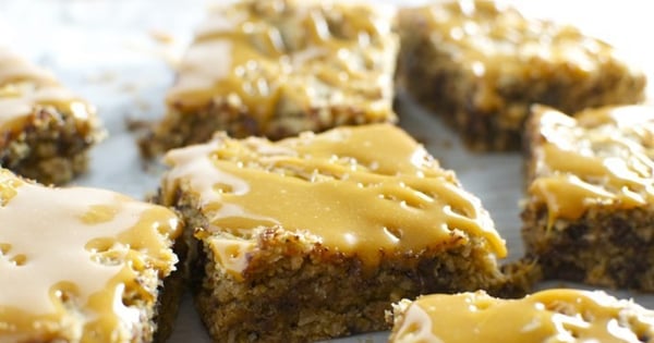 Chocolate Chip Oatmeal Blondies with Coconut and Caramel Drizzle