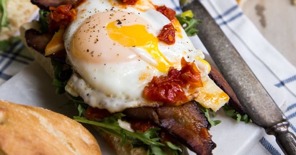 Bacon Egg and Arugula Breakfast Sandwich on Ciabatta Bread