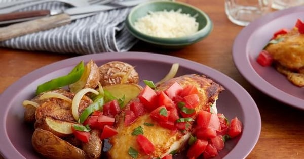 Parmesan Crusted Chicken Breasts with Tomato and Basil and Potatoes with Peppers and Onions