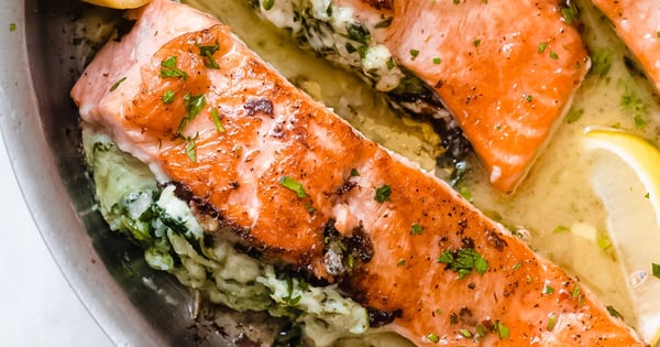 Creamy Spinach Artichoke Stuffed Salmon with Lemon Butter Sauce