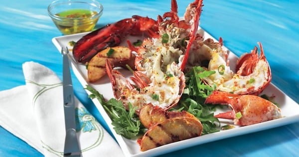Grilled lobster and peaches with lemon and pink pepper