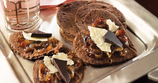 Dark chocolate blinis with raspberry-onion confit and 5-year-old cheddar