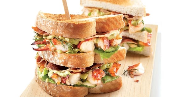 Lobster club sandwich with sweet lime mayonnaise and avocado