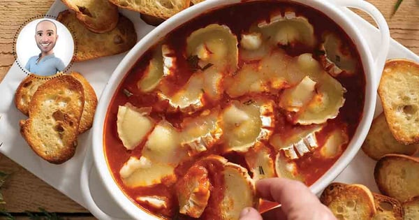 Warm goat cheese with tomato sauce