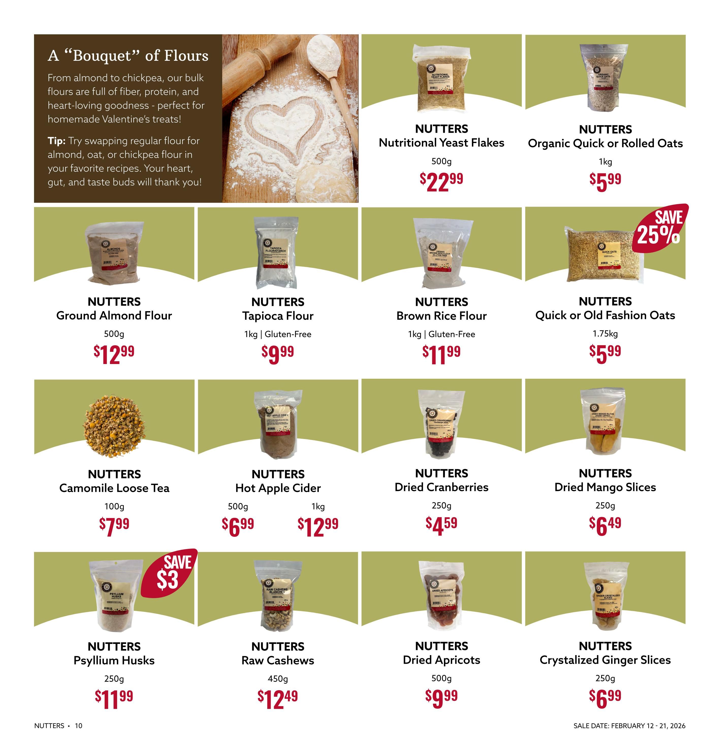 Nutter's Bulk & Natural Foods flyer page 10, featuring a variety of flours and dried goods. Products include Nutters Nutritional Yeast Flakes for $22.99, Nutters Organic Quick or Rolled Oats for $5.99 with a 25% saving, Nutters Ground Almond Flour for $12.99, Nutters Tapioca Flour (Gluten-Free) for $9.99, Nutters Brown Rice Flour (Gluten-Free) for $11.99, Nutters Camomile Loose Tea (100g) for $7.99, Nutters Hot Apple Cider (1kg) for $12.99, Nutters Dried Cranberries (250g) for $4.59, Nutters Dried Mango Slices (250g) for $6.49, Nutters Psyllium Husks (250g) for $11.99 with a save $3 tag, Nutters Raw Cashews (450g) for $12.49, Nutters Dried Apricots (500g) for $9.99, and Nutters Crystallized Ginger Slices (250g) for $6.99. The page highlights a 'Bouquet' of flours, suggesting they are perfect for homemade Valentine's treats and are full of fiber, protein, and heart-loving goodness. Sale dates are February 12 - 21, 2026.