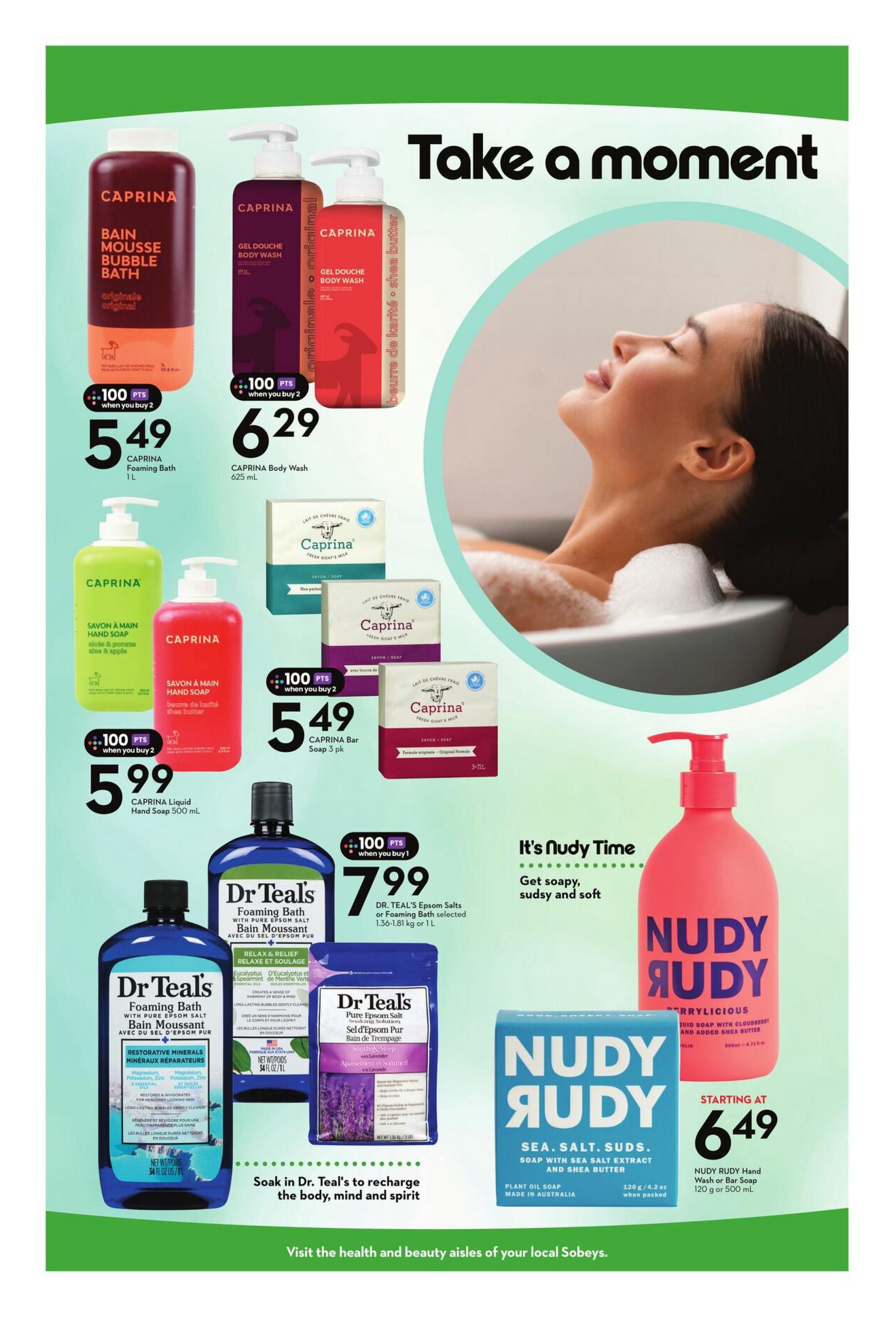 Sobeys Health & Beauty flyer page 5 features Caprina products including Caprina Foaming Bath 1L for $5.49 when you buy 2, and Caprina Body Wash 625 mL for $6.29 when you buy 2. Also available are Caprina Liquid Hand Soap 500 mL for $5.99 when you buy 2, and Caprina Bar Soap 3 pk. Dr. Teal's offers Epsom Salts or Foaming Bath selected sizes 1.36-1.81 kg or 1 L for $7.99 when you buy 1. Nudy Rudy Hand Wash or Bar Soap 120 g or 500 mL is starting at $6.49. The page has a large image of a woman relaxing in a bath and the tagline 'Take a Moment'.
