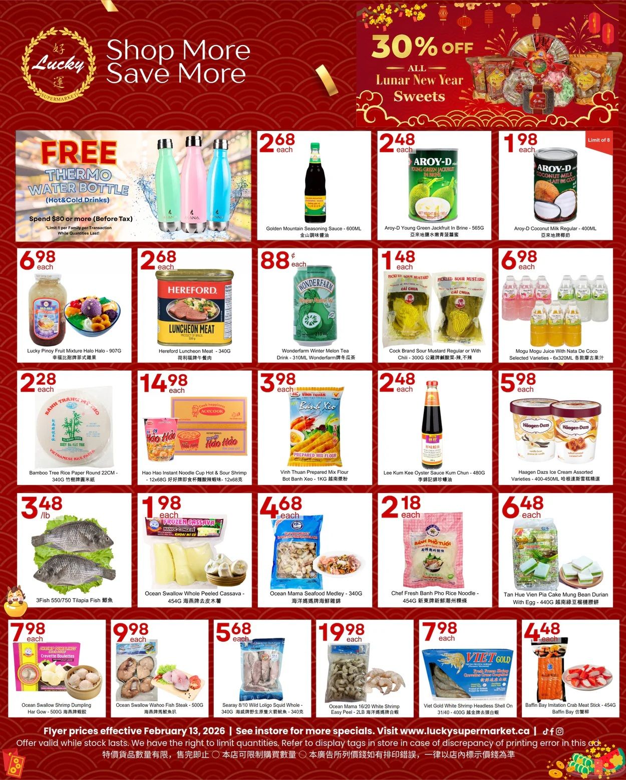 Lucky Supermarket weekly flyer specials for Edmonton, page 2. Get a FREE Thermo Water Bottle when you spend $80 or more (before tax), limit 1 per family, while quantities last. Featured products include Golden Mountain Seasoning Sauce for $2.68, Aroy-D Young Green Jackfruit in Brine for $2.48, and Aroy-D Coconut Milk Regular for $1.98. Also available are Lucky Pinoy Fruit Mixture Halo Halo for $6.98, Hereford Luncheon Meat for $2.68, Wonderfarm Winter Melon Tea Drink for $0.88, Cock Brand Sour Mustard for $1.48, and Mogu Mogu Juice with Nata De Coco for $6.98. Other deals include Bamboo Tree Rice Paper for $2.28, Hao Hao Instant Noodle Cup & Sour Shrimp for $14.98, Vinh Thuan Prepared Mix Flour for $3.98, Lee Kum Kee Oyster Sauce Kum Chun for $2.48, and Haagen Dazs Ice Cream Assorted Varieties for $5.98. Seafood specials feature 3Fish 550/750 Tilapia Fish for $3.48/lb, Ocean Swallow Whole Peeled Cassava for $1.98, Ocean Mama Seafood Medley for $4.68, Chef Fresh Banh Pho Rice Noodle for $2.18, and Tan Hue Vien Pia Cake Mung Bean Durian with Egg for $6.48. Additional offers include Ocean Swallow Shrimp Dumpling for $7.98, Ocean Swallow Wahoo Fish Steak for $9.98, Searay Wild Loligo Squid Whole for $5.68, Ocean Mama White Shrimp Easy Peel for $19.98, Viet Gold White Shrimp Headless Shell On for $7.98, and Baffin Bay Imitation Crab Meat Stick for $4.48. Flyer prices are effective February 13-26, 2026. Visit www.luckysupermarket.ca for more details.