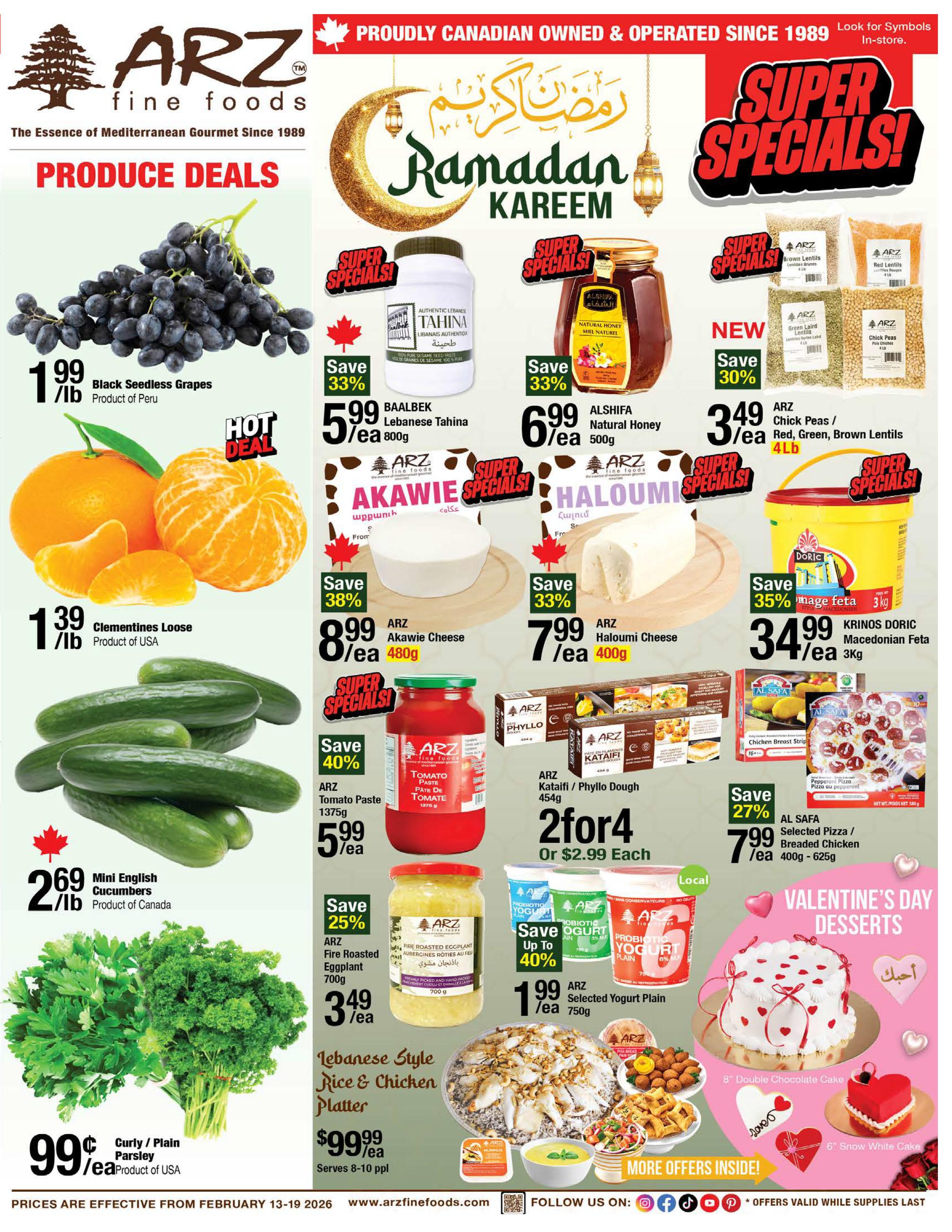 ARZ Fine Foods weekly flyer specials page 1 features produce deals including Black Seedless Grapes for $1.99/lb, Clementines Loose from the USA for $1.39/lb, and Mini English Cucumbers from Canada for $2.69/lb. Also featured are Baalbæk Lebanese Tahini for $5.99/ea (800g) with 33% off, Alshifa Natural Honey for $6.99/ea (500g) with 33% off, ARZ Akawie Cheese for $8.99/ea (480g) with 38% off, and ARZ Haloumi Cheese for $7.99/ea (400g) with 33% off. Super specials include ARZ Tomato Paste for $5.99/ea (1375g) with 40% off, ARZ Kataifi / Phyllo Dough for $2.99 each or 2 for $4 (454g), and Krinos Dorić Macedonian Feta for $34.99/ea (3kg). New items include ARZ Chick Peas / Red, Green, Brown Lentils for $3.49/ea (4lb) with 30% off. Al Safa Selected Pizza / Breaded Chicken is on sale for $7.99/ea (400g - 625g) with 27% off. Other specials include ARZ Fire Roasted Eggplant for $3.49/ea (700g) with 25% off, ARZ Selected Yogurt for $1.99/ea (750g) with up to 40% off, and a Lebanese Style Rice & Chicken Platter for $99.99/ea serving 8-10 people. Curly/Plain Parsley from the USA is 99¢/ea. Valentine's Day Desserts include an 8' Double Chocolate Cake and a 6' Snow White Cake. Prices are effective February 13-19, 2026.
