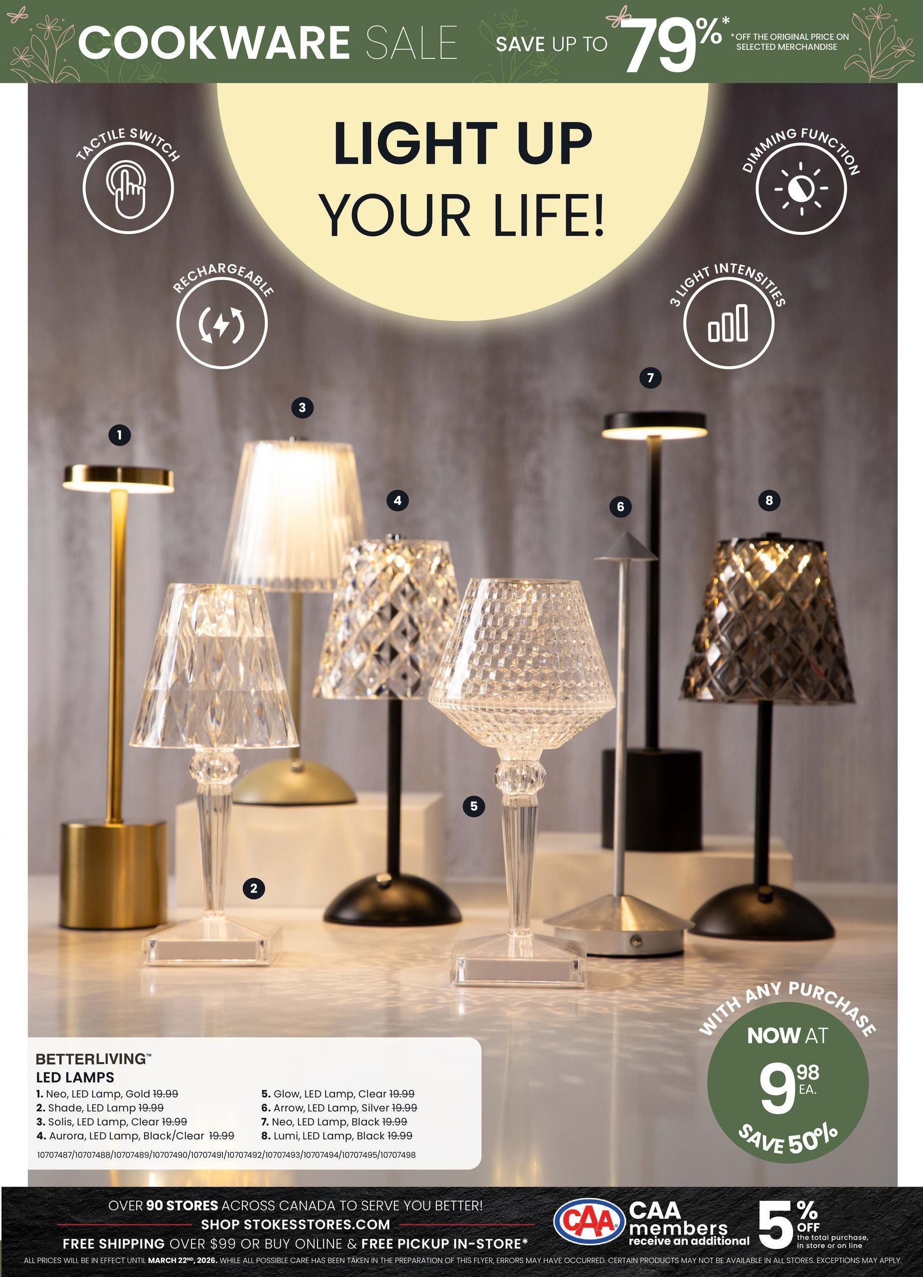 Stokes flyer page featuring LED lamps with the headline 'Light Up Your Life!'. The page showcases various Betterliving LED lamps including the Neo LED Lamp in Gold for $19.99, Shade LED Lamp for $19.99, Solis LED Lamp in Clear for $19.99, Aurora LED Lamp in Black/Clear for $19.99, Glow LED Lamp in Clear for $19.99, Arrow LED Lamp in Silver for $19.99, Neo LED Lamp in Black for $19.99, and Lumi LED Lamp in Black for $19.99. A special offer highlights a purchase now at $9.98 each, saving 50%. Additional promotions include free shipping on orders over $99 and a 5% discount for CAA members on total purchases in-store or online. The flyer is valid until March 22, 2026.