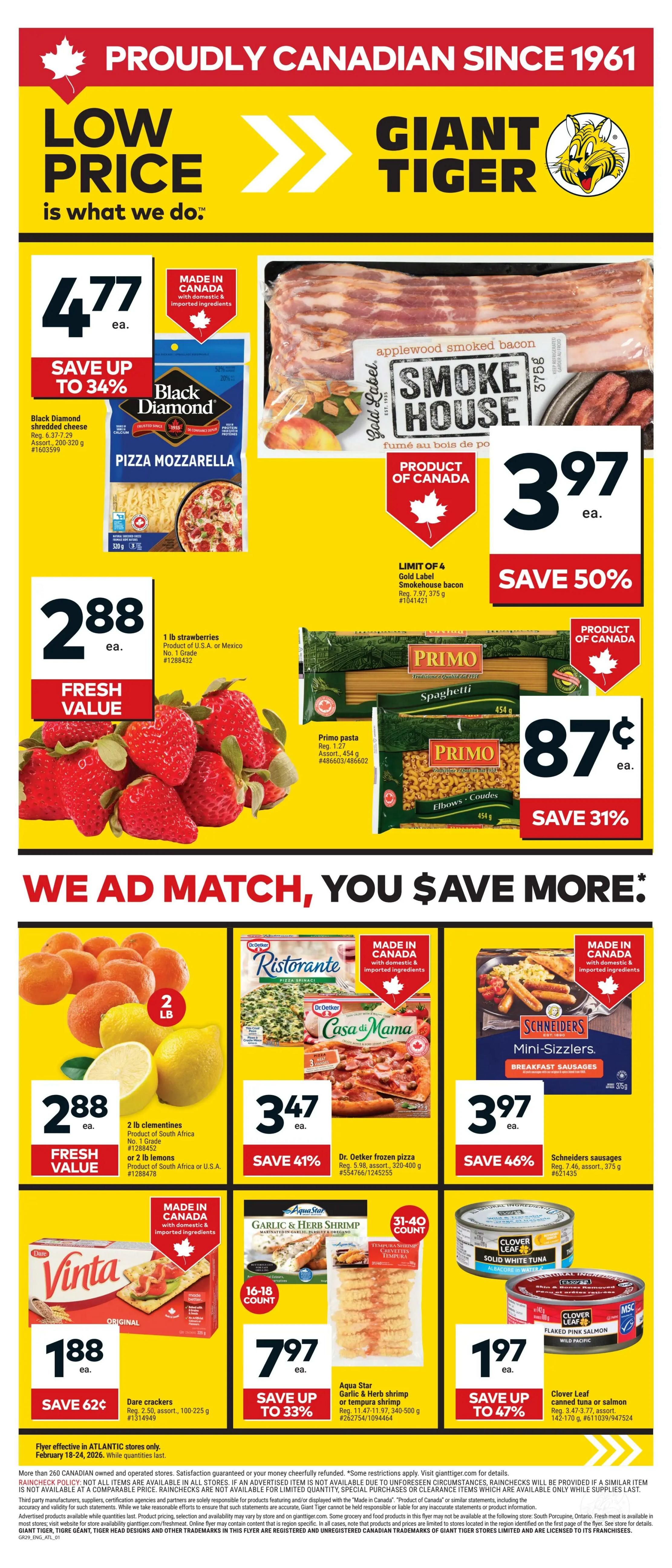 Giant Tiger Atlantic Canada flyer page 1 featuring a 'Low Price is What We Do' theme. Featured products include Black Diamond Pizza Mozzarella shredded cheese for $4.77, save up to 34%. Gold Label Smoke House applewood smoked bacon is on sale for $3.97, save 50%. Fresh value 1 lb strawberries are $2.88. Primo spaghetti and elbow pasta are $0.87, save 31%. Dr. Oetker frozen pizza is $3.97, save 46%. Schneiders sausages are $3.97, save 46%. 2 lb clementines or lemons are $2.88. Aqua Star Garlic & Herb shrimp or tempura shrimp is $7.97, save up to 33%. Dare crackers are $1.88, save 62 cents. Clover Leaf canned tuna or salmon is $1.97, save up to 47%. Flyer effective February 18-24, 2026, while quantities last, quantities last, Atlantic stores only.