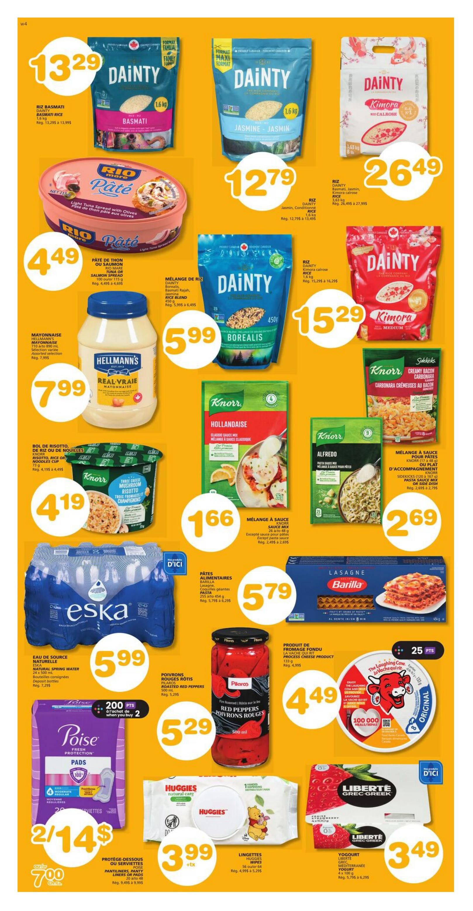 Page 8 of the IGA flyer for The Magdalen Islands. Featured items include Dainty Basmati Rice 1.6 kg for $13.29, Dainty Jasmine Rice 1.6 kg for $12.79, and Dainty Kimora Calrose Rice 3.63 kg for $26.49. Also on sale is Rio Mare Tuna or Salmon Spread 115 g for $4.49. Hellmann's Real Mayonnaise 710 mL to 890 mL is $7.99. Knorr Risotto or Noodles Cup 75 g is $4.19. Knorr Hollandaise Sauce Mix 48 g is $1.66. Knorr Creamy Bacon Carbonara Pasta Sauce Mix or Side Dish 120 g to 167 g is $2.69. Eska Natural Spring Water 24 x 500 mL is $5.99. Pilos Roasted Red Peppers 500 mL is $5.29. The Laughing Cow Process Cheese Product 133 g is $4.49 and comes with 25 points. Poise Pantiliners or Pads 20 to 48 units are 2 for $14, or $7.00 each. Huggies Natural Care Wipes 56 to 64 units are $3.99 plus tax. Liberté Greek Mediterranean Yogurt Strawberry 4 x 100 g is $3.49. Barilla Lasagna Pasta 454 g is $5.79.