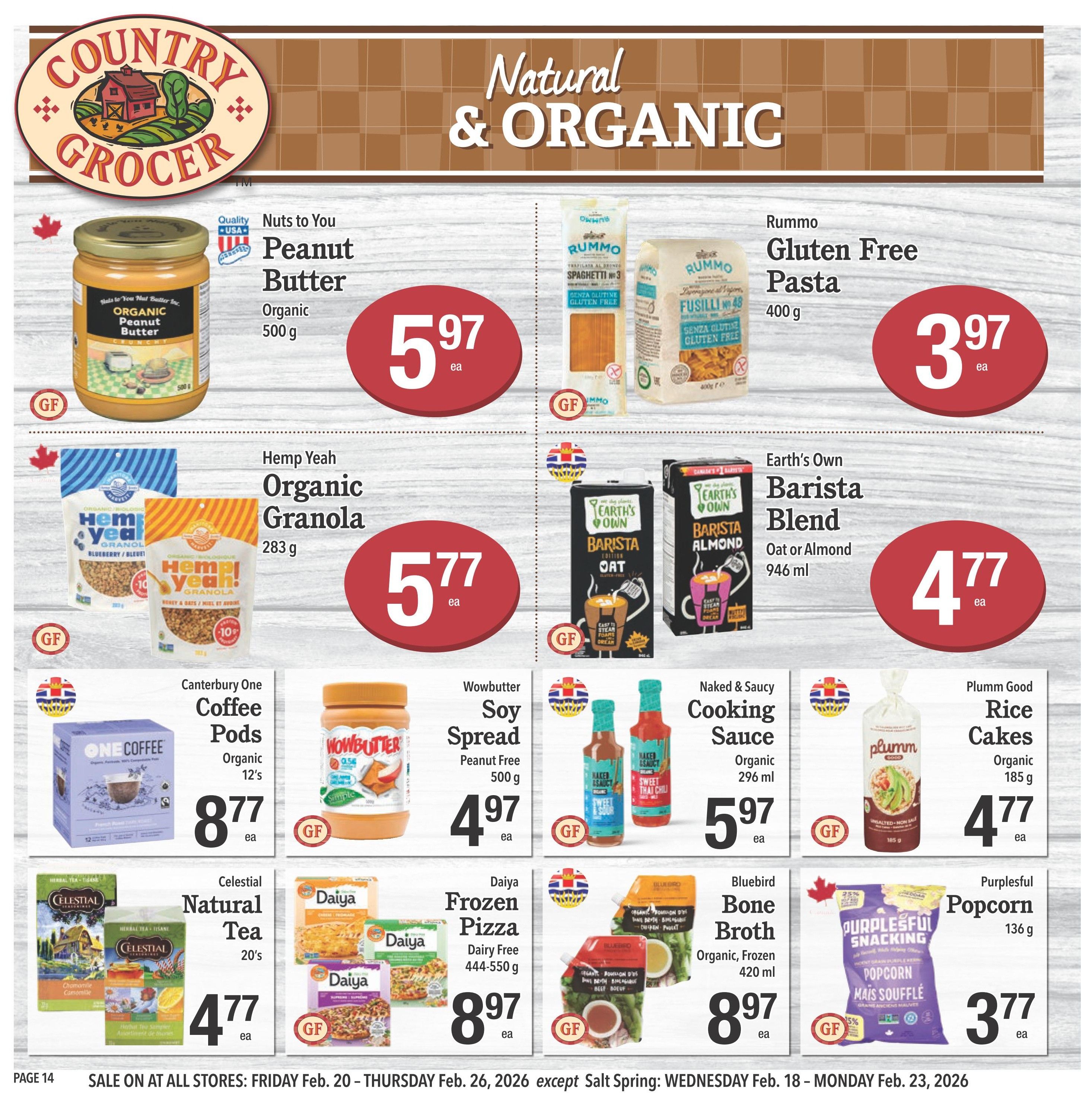 Country Grocer weekly flyer specials page 14, featuring natural and organic products. Deals include Nuts to You Organic Peanut Butter for $5.97, Rummo Gluten Free Pasta for $3.97, Hemp Yeah Organic Granola for $5.77, and Earth's Own Barista Blend Oat or Almond milk for $4.77. Also on sale are Canterbury One Coffee Pods Organic 12's for $8.77, Wowbutter Soy Spread Peanut Free 500g for $4.97, Naked & Saucy Cooking Sauce Organic 296ml for $5.97, and Plumm Good Rice Cakes Organic 185g for $4.77. Additional offers include Celestial Natural Tea 20's for $4.77, Daiya Frozen Pizza Dairy Free 444-550g for $8.97, Bluebird Bone Broth Organic, Frozen 420ml for $3.97, and Purplesful Popcorn 136g for $3.77. Sale valid Friday, Feb. 20 to Thursday, Feb. 26, 2026, except Salt Spring: Wednesday, Feb. 18 to Monday, Feb. 23, 2026.