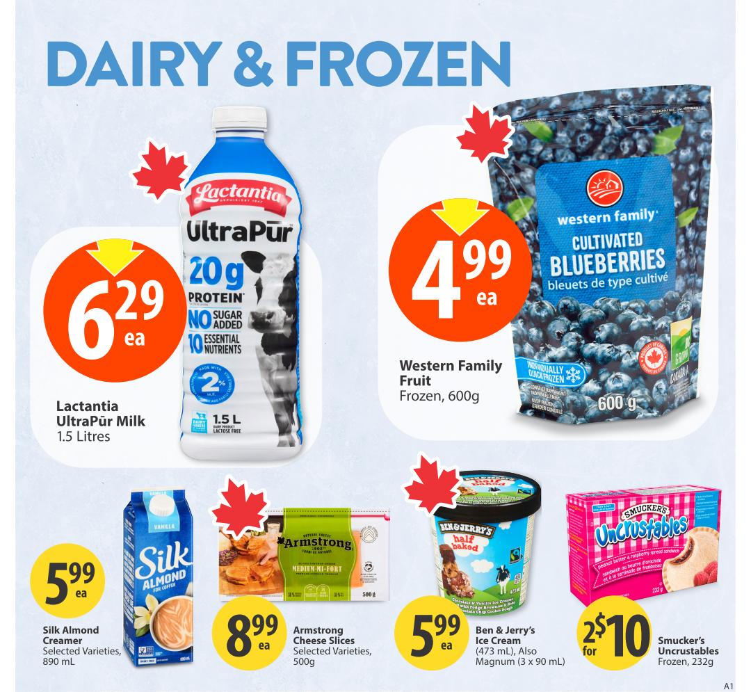 Save-On-Foods weekly flyer specials page featuring dairy and frozen items. Lactantia UltraPur Milk, 1.5 Litres, is on sale for $6.29 each. Western Family Cultivated Blueberries, frozen, 600g, are priced at $4.99 each. Silk Almond Creamer, selected varieties, 890 mL, costs $5.99 each. Armstrong Cheese Slices, selected varieties, 500g, are available for $8.99 each. Ben & Jerry's Ice Cream, 473 mL, including the Half Baked flavour, is $5.99 each. Smucker's Uncrustables, frozen, 232g, are on special at 2 for $10.