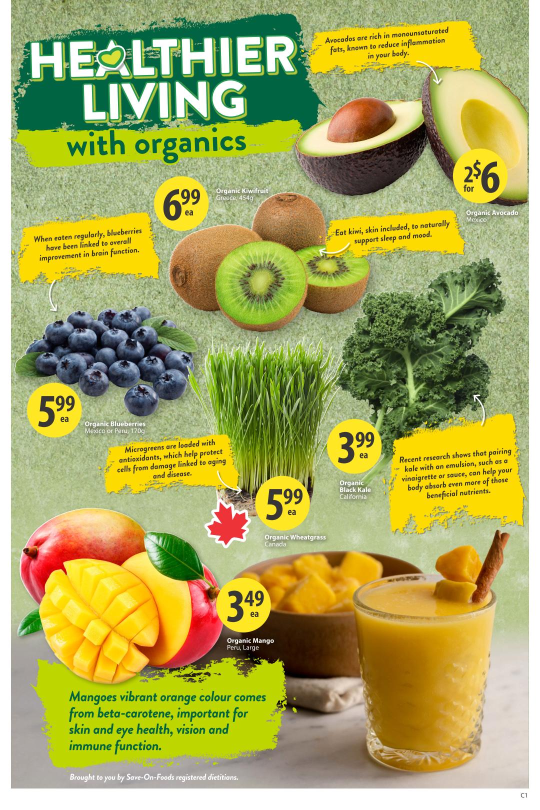 Save-On-Foods weekly flyer specials page 4, featuring 'Healthier Living with Organics'. Highlights include Organic Kiwifruit from Greece for $6.99 each, and Organic Avocados from Mexico for 2 for $6. Blueberries from Mexico or Peru are $5.99 each and are noted for improving brain function. Organic Wheatgrass from Canada is $5.99 each, with microgreens noted for antioxidant properties. Organic Black Kale from California is $3.99 each, with benefits of pairing kale with an emulsion. Large Organic Mangoes from Peru are $3.49 each, with their vibrant orange colour noted for beta-carotene benefits for skin, eye health, vision, and immune function. The page also features information about avocados being rich in monounsaturated fats that reduce inflammation.