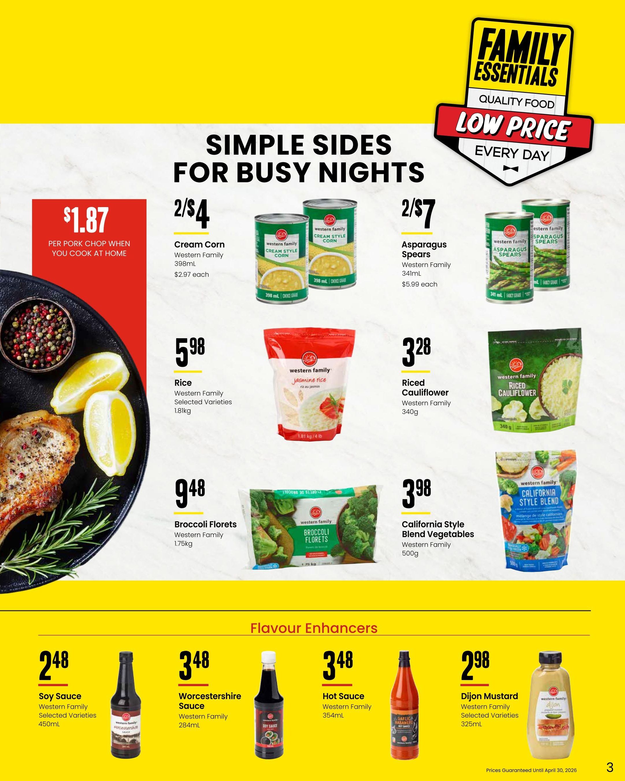 Freson Bros flyer page 3 features 'Simple Sides for Busy Nights' with deals on Western Family products. Get Cream Style Corn for 2 for $4, Asparagus Spears for 2 for $7, Western Family Rice for $5.98 per 1.81kg bag, Riced Cauliflower for $3.28 per 340g bag, Broccoli Florets for $9.48 per 1.75kg bag, and California Style Blend Vegetables for $3.98 per 500g bag. Also featured are 'Flavour Enhancers' including Western Family Soy Sauce for $2.48 per 450mL, Worcestershire Sauce for $3.48 per 284mL, Hot Sauce for $3.48 per 354mL, and Dijon Mustard for $2.98 per 325mL. A pork chop with lemon and peppercorns is pictured with a price of $1.87 per pork chop when you cook at home. Prices guaranteed until April 30, 2026.