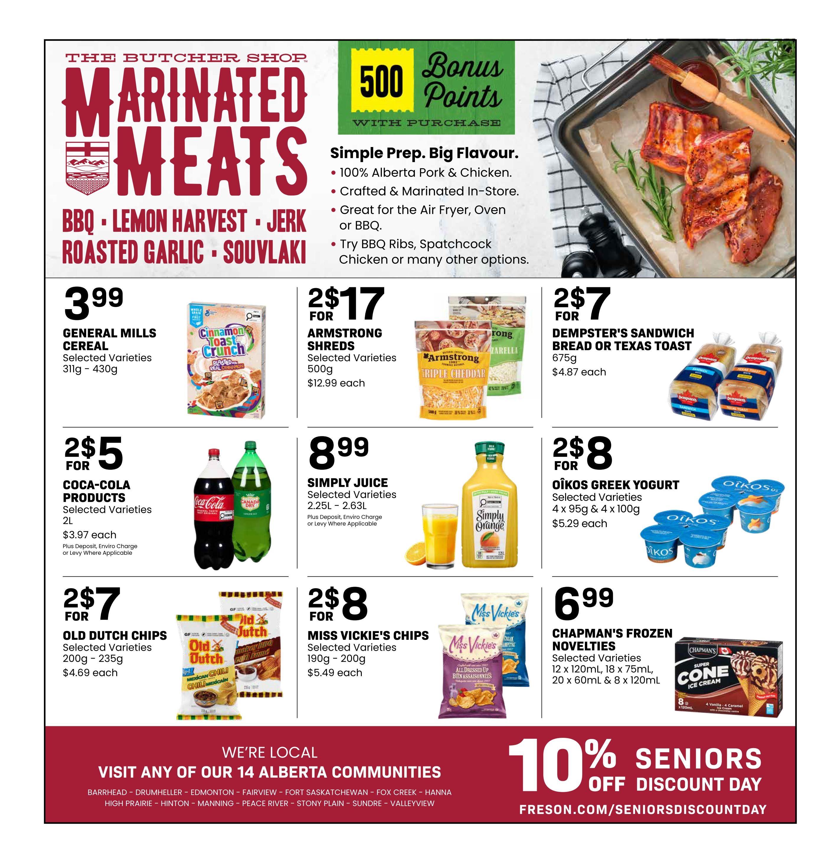 Freson Bros weekly flyer specials page 12 features marinated meats with BBQ, Lemon Harvest, Jerk, Roasted Garlic, and Souvlaki options, offering 500 bonus points with purchase. Deals include General Mills Cereal for $3.99, Armstrong Shreds cheese for 2 for $17, and Dempster's Sandwich Bread or Texas Toast for 2 for $7. Also featured are Coca-Cola Products for 2 for $5, Simply Juice for $8.99, and Oikos Greek Yogurt for 2 for $8. Snack deals include Old Dutch Chips for 2 for $7 and Miss Vickie's Chips for 2 for $8. Chapman's Frozen Novelties are on sale for $6.99. The bottom of the page highlights 'We're Local - Visit any of our 14 Alberta Communities' and '10% Seniors Off Discount Day' with the website freson.com/seniorsdiscountday.