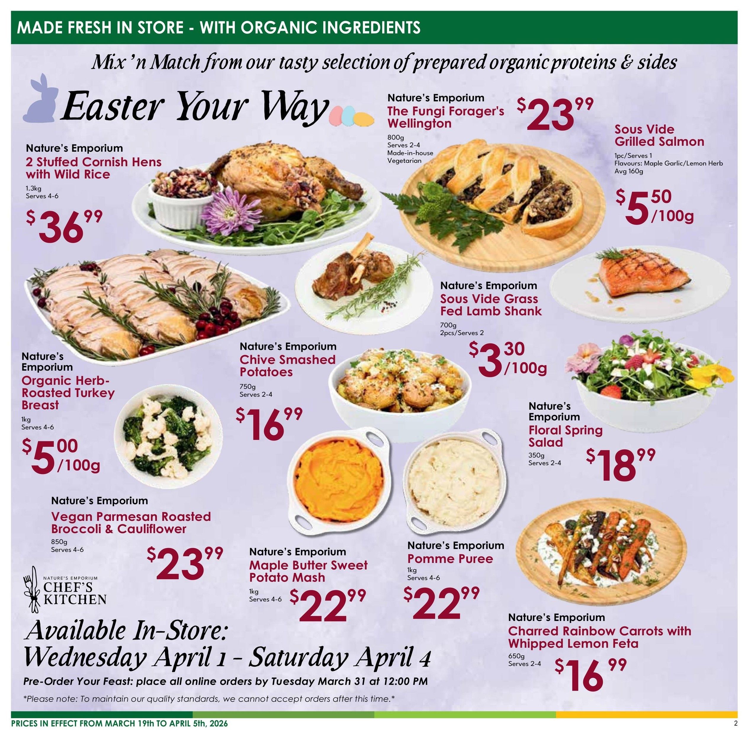 Nature's Emporium flyer specials page 2, featuring 'Easter Your Way' prepared organic proteins and sides. Highlights include Nature's Emporium 2 Stuffed Cornish Hens with Wild Rice for $36.99 (1.3kg, serves 4-6), Nature's Emporium The Fungi Forager's Wellington for $23.99 (800g, serves 2-4, vegetarian), Sous Vide Grilled Salmon for $5.50/100g (avg 160g, available in Maple Garlic/Lemon Herb), Nature's Emporium Organic Herb-Roasted Turkey Breast for $5.00/100g (1kg, serves 4-6), Nature's Emporium Chive Smashed Potatoes for $16.99 (750g, serves 2-4), Nature's Emporium Floral Spring Salad for $18.99 (350g, serves 2-4), Nature's Emporium Sous Vide Grass Fed Lamb Shank for $3.30/100g (700g, 2pcs/serves 2), Nature's Emporium Vegan Parmesan Roasted Broccoli & Cauliflower for $23.99 (850g, serves 4-6), Nature's Emporium Maple Butter Sweet Potato Mash for $22.99 (1kg, serves 4-6), Nature's Emporium Pomme Puree for $22.99 (1kg, serves 4-6), and Nature's Emporium Charred Rainbow Carrots with Whipped Lemon Feta for $16.99 (650g, serves 2-4). Available in-store Wednesday April 1 - Saturday April 4. Pre-orders must be placed by Tuesday March 31 at 12:00 PM. Prices are effective from March 19th to April 5th, 2026.