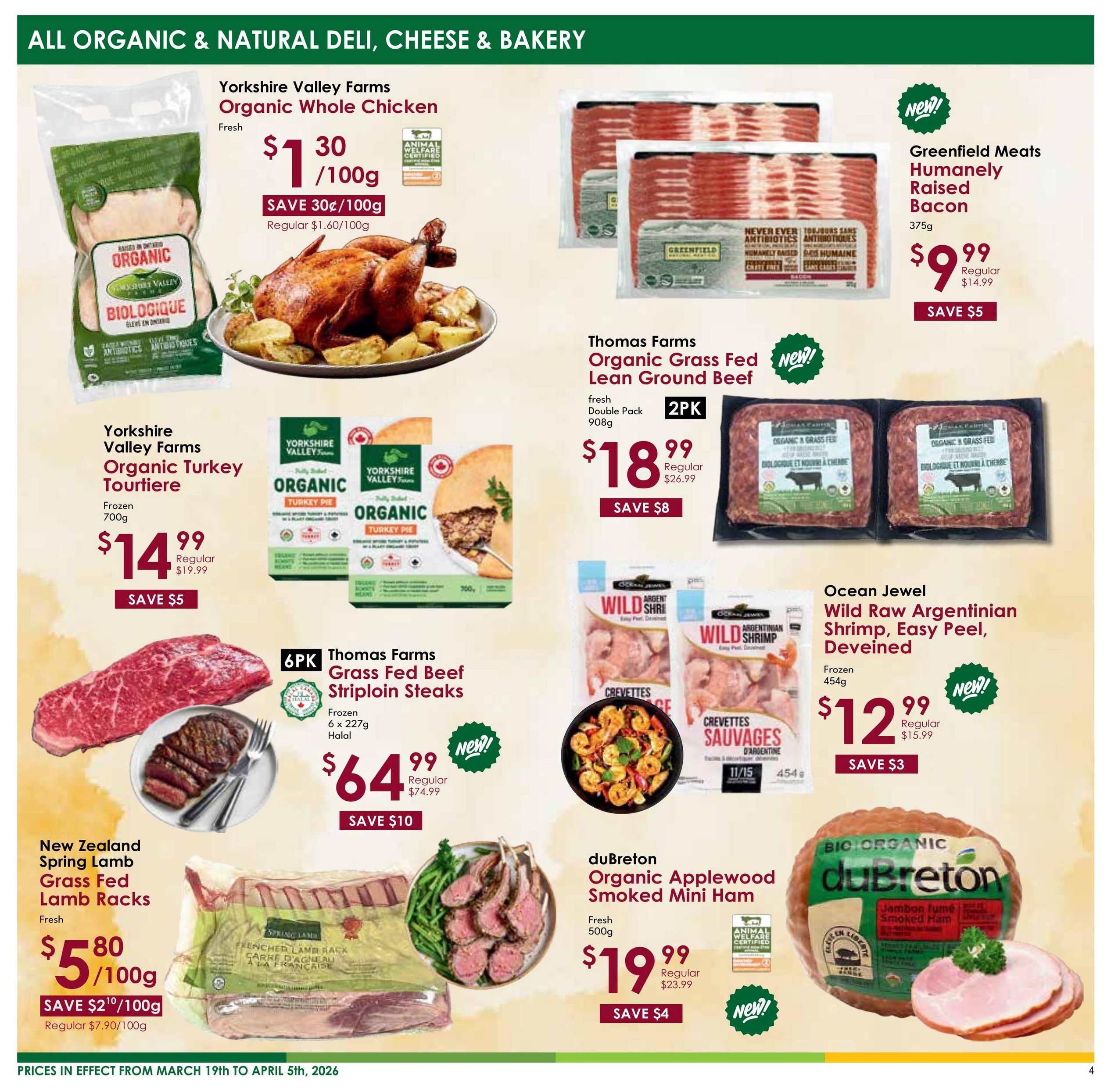 Nature's Emporium flyer specials page 4 features organic and natural deli, cheese, and bakery items. Highlights include Yorkshire Valley Farms Organic Whole Chicken for $1.30/100g, saving 30¢/100g. Greenfield Meats Humanely Raised Bacon (375g) is $9.99, saving $5. Thomas Farms Organic Grass Fed Lean Ground Beef (2 x 908g Double Pack) is $18.99, saving $8. Yorkshire Valley Farms Organic Turkey Tourtiere (frozen 700g) is $14.99, saving $5. Thomas Farms Grass Fed Beef Striploin Steaks (6 x 227g frozen Halal) are $64.99, saving $10. Ocean Jewel Wild Raw Argentinian Shrimp, Easy Peel, Deveined (frozen 454g) is $12.99, saving $3. New Zealand Spring Lamb Grass Fed Lamb Racks (fresh) are $5.80/100g, saving $2.10/100g. duBreton Organic Applewood Smoked Mini Ham (fresh 500g) is $19.99, saving $4. Prices are effective from March 19th to April 5th, 2026.