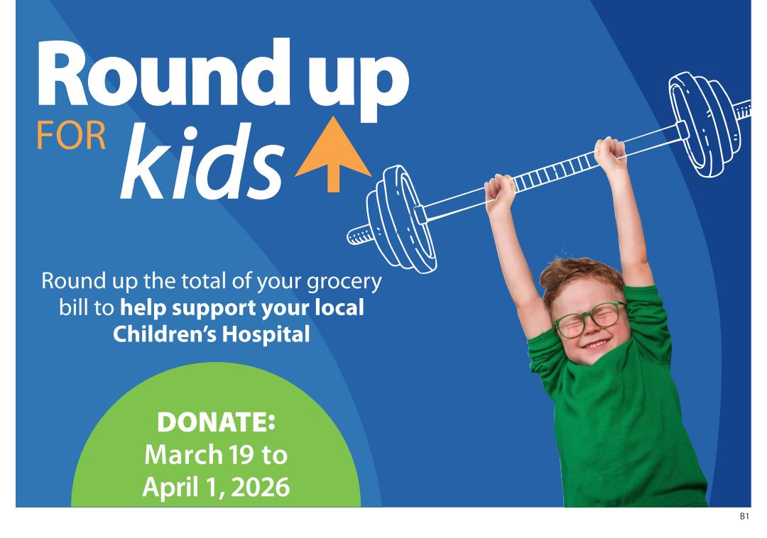Save-On-Foods flyer page promoting a 'Round up for Kids' campaign. The page features a smiling child in a green sweater lifting a barbell, with the text 'Round up the total of your grocery bill to help support your local Children's Hospital'. The donation period is from March 19 to April 1, 2026.