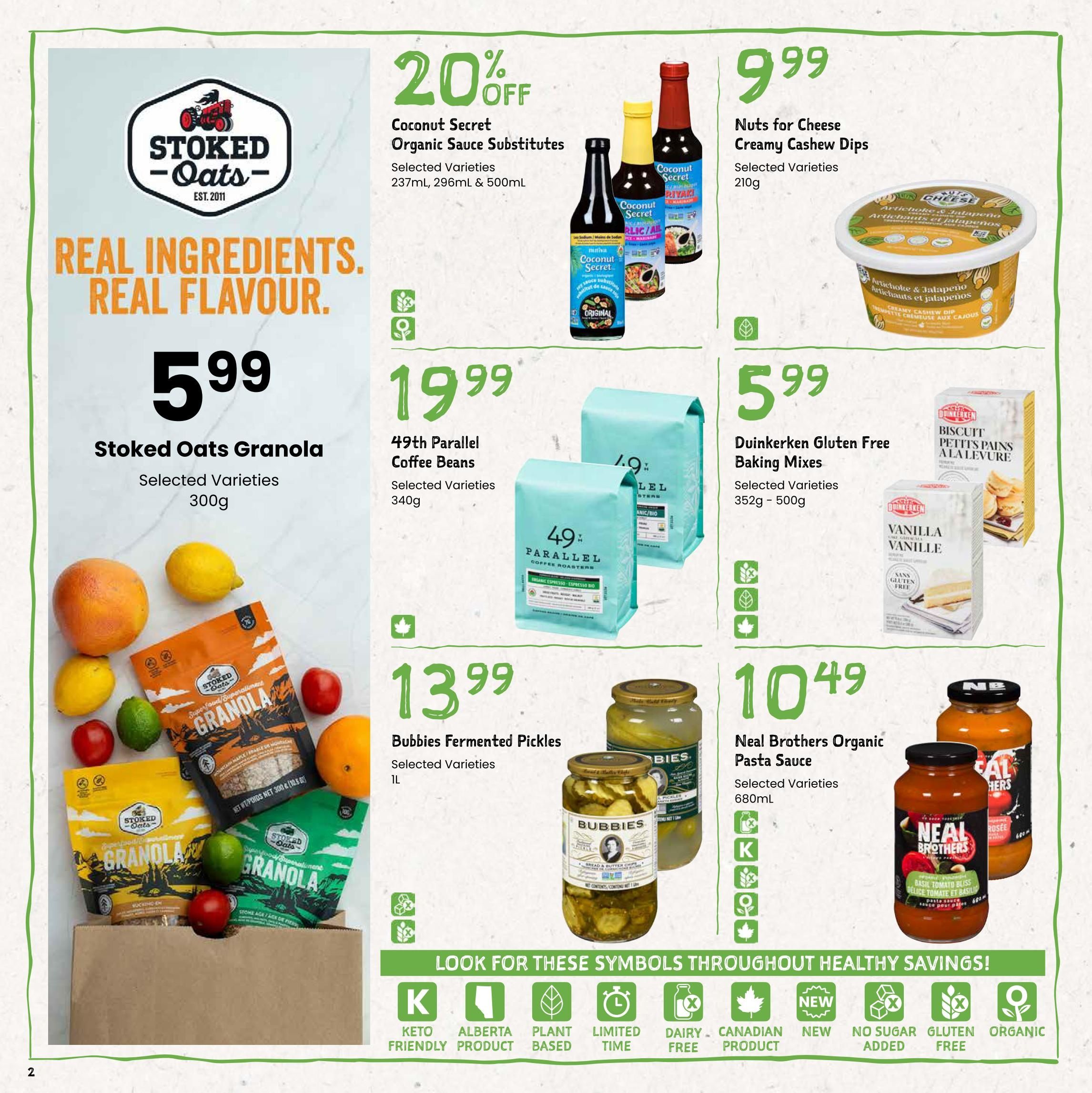 Freson Bros flyer page 2 features Stoked Oats Granola in selected varieties and 300g size for $5.99. Also available are Coconut Secret Organic Sauce Substitutes, selected varieties, 237ml, 296ml & 500ml, with a 20% off discount. Nuts for Cheese Creamy Cashew Dips, selected varieties, 210g, are priced at $9.99. 49th Parallel Coffee Beans, selected varieties, 340g, cost $19.99. Duinkerken Gluten Free Baking Mixes, selected varieties, 352g - 500g, are $5.99. Bubbies Fermented Pickles, selected varieties, 1L, are $13.99. Neal Brothers Organic Pasta Sauce, selected varieties, 680ml, is $10.49. The page also highlights symbols for Keto Friendly, Alberta Product, Plant Based, Limited Time, Dairy Free, Canadian Product, New, No Sugar Added, and Gluten Free.
