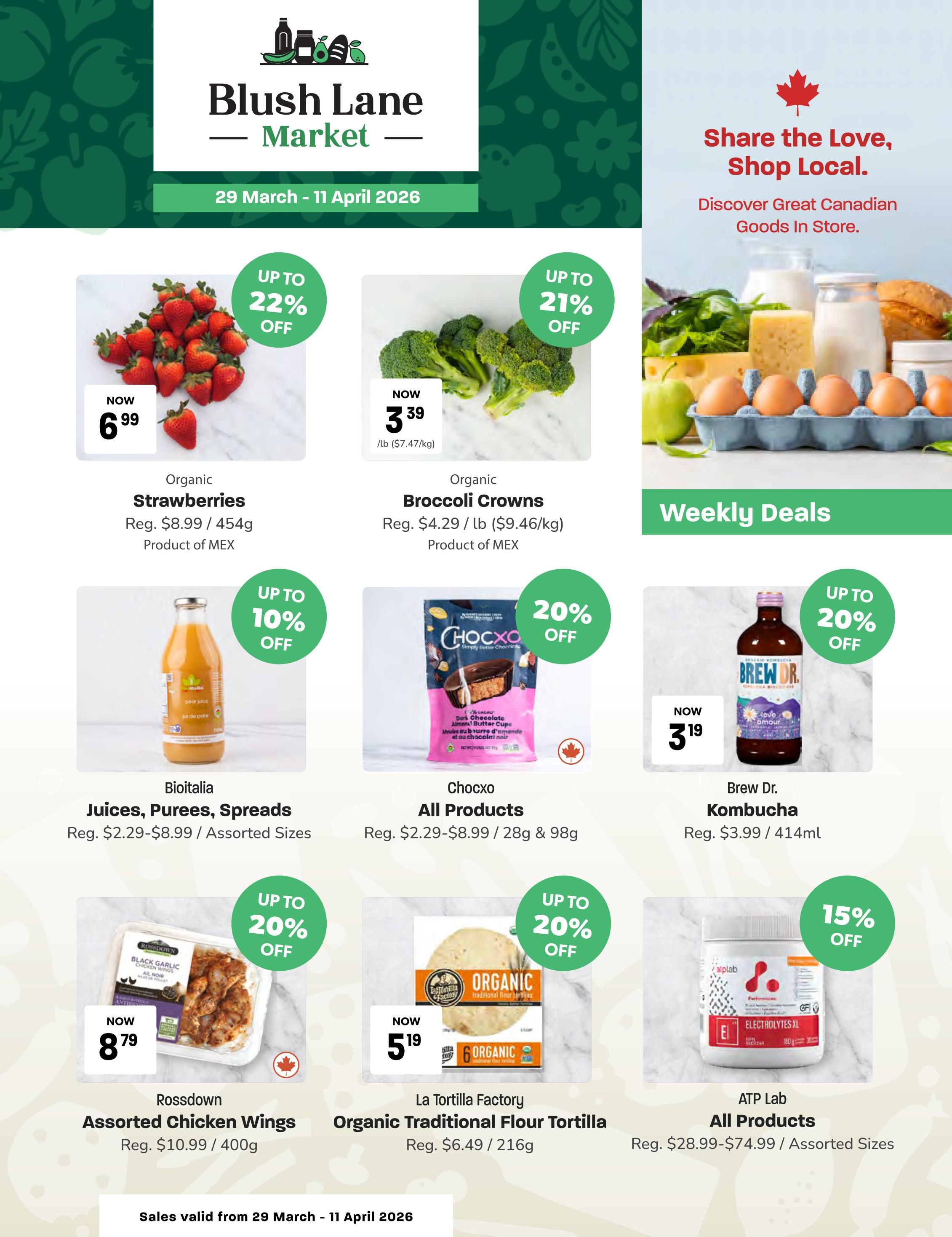 Blush Lane Organic Market flyer for March 29 - April 11, 2026. Weekly deals include Organic Strawberries now $6.99 (up to 22% off), Organic Broccoli Crowns now $3.39/lb (up to 21% off), Bioitalia Juices, Purees, Spreads now starting at $2.29 (up to 10% off), Chocxo All Products now starting at $2.29 (20% off), Brew Dr. Kombucha now $3.19 (up to 20% off), Rossdown Assorted Chicken Wings now $8.79 (up to 20% off), La Tortilla Factory Organic Traditional Flour Tortilla now $5.19 (20% off), and ATP Lab All Products now starting at $28.99 (15% off). The flyer also features a section on 'Share the Love, Shop Local. Discover Great Canadian Goods In Store.