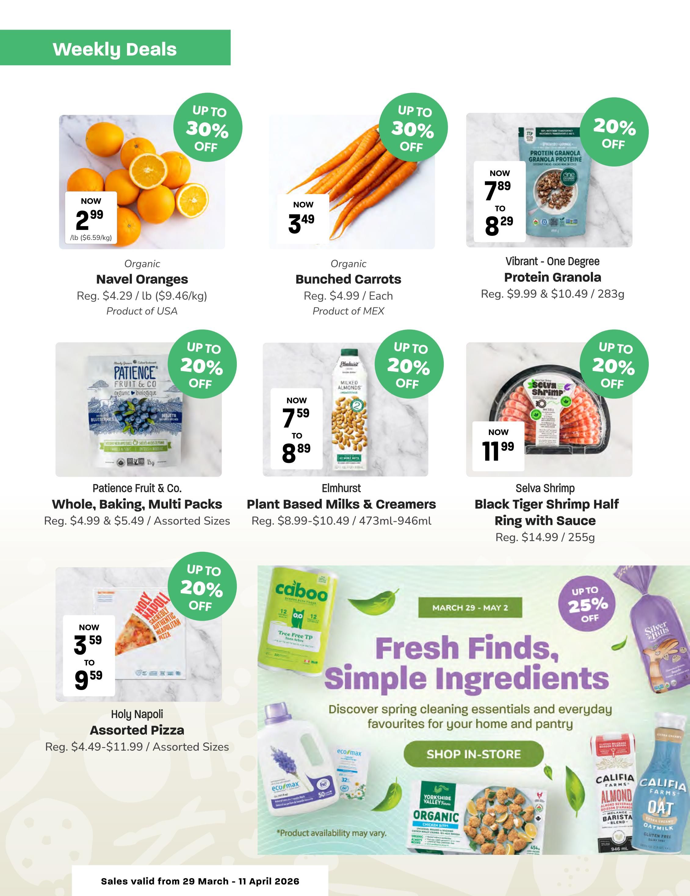 Blush Lane Organic Market Weekly Deals page 2. Featuring Organic Navel Oranges now $2.99/lb (up to 30% off), Organic Bunched Carrots now $3.49 each (up to 30% off), and Vibrant - One Degree Protein Granola now $7.89 to $8.29 (20% off). Also available are Patience Fruit & Co. Whole, Baking, Multi Packs for $4.99 & $5.49 (up to 20% off), Elmhurst Plant Based Milks & Creamers for $7.59 to $8.89 (up to 20% off), and Selva Shrimp Black Tiger Shrimp Half Ring with Sauce for $11.99 (up to 20% off). Additionally, Holy Napoli Assorted Pizza is on sale for $3.59 to $9.59 (up to 20% off). The page also highlights 'Fresh Finds, Simple Ingredients' with spring cleaning essentials and pantry favourites, featuring Caboo Tree Free TP, EcoMax Laundry Detergent, Yorkshire Valley Organic Chicken Bites, Califia Farms Almond Milk and Oat Milk. Sales valid from March 29 - April 11, 2026.