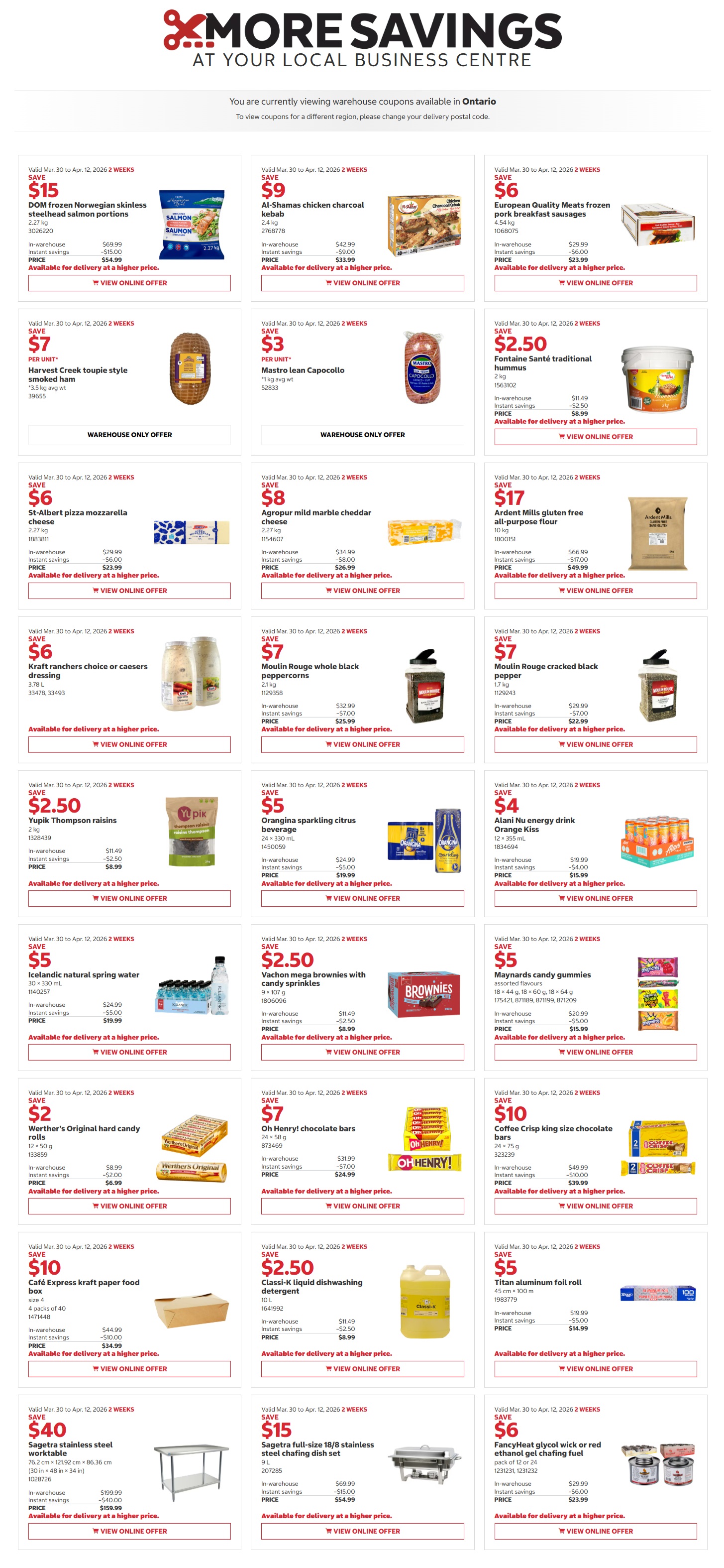 Costco flyer featuring 'More Savings at Your Local Business Centre' valid from March 30 to April 12, 2026. The flyer showcases various deals across different categories. In frozen foods, save $15 on DOM frozen Norwegian skinless steelhead salmon portions (2.27 kg), now $54.99. Al-Shamas chicken charcoal kebab (2.4 kg) is $9 off, priced at $33.99. European Quality Meats frozen pork breakfast sausages (4.54 kg) are $6 off, now $23.99. Meat and deli items include Harvest Creek toupie style smoked ham (3.5 kg avg wt) saving $7 per unit, and Mastro lean Capocollo (1 kg avg wt) saving $3 per unit; both are warehouse-only offers. Dairy and cheese deals feature St-Albert pizza mozzarella cheese (2.27 kg) for $23.99 after a $6 saving, and Agropur mild marble cheddar cheese (2.27 kg) for $26.99 after an $8 saving. Fontaine Santé traditional hummus (2 kg) is $2.50 off, now $8.99. Pantry staples include Ardent Mills gluten free all-purpose flour (10 kg) for $49.99, saving $17. Kraft ranchers choice or caesars dressing (3.78 L) saves $6. Moulin Rouge whole black peppercorns (2.1 kg) are $7 off, now $25.99, and Moulin Rouge cracked black pepper (1.7 kg) is $7 off, now $22.99. Yupik Thompson raisins (2 kg) are $2.50 off, now $8.99. Beverage savings include Orangina sparkling citrus beverage (24 x 330 mL) for $19.99, saving $5. Alani Nu energy drink Orange Kiss (12 x 355 mL) is $4 off, now $15.99. Icelandic natural spring water (24 x 330 mL) is $5 off, now $19.99. Snacks and treats feature Vachon mega brownies with candy sprinkles (9 x 107 g) for $8.99, saving $2.50. Maynards candy gummies (assorted flavours) are $5 off, now $15.99. Werther's Original hard candy rolls (12 x 50 g) are $2 off, now $6.99. Oh Henry! chocolate bars (24 x 58 g) are $7 off, now $24.99. Coffee Crisp king size chocolate bars (24 x 75 g) are $10 off, now $39.99. Household and business supplies include Café Express kraft paper food box (4 packs of 40) for $34.99, saving $10. Classi-K liquid dishwashing detergent (10 L) is $2.50 off, now $8.99. Titan aluminum foil roll (45 cm x 100 m) is $5 off, now $14.99. Finally, business equipment deals feature a Sagetra stainless steel worktable (76.2 cm x 121.92 cm x 86.36 cm) for $159.99, saving $40. A Sagetra full-size 18/8 stainless steel chafing dish set (9 L) is $15 off, now $54.99. FancyHeat glycol wick or red ethanol gel chafing fuel (pack of 12 or 24) is $6 off, now $23.99.
