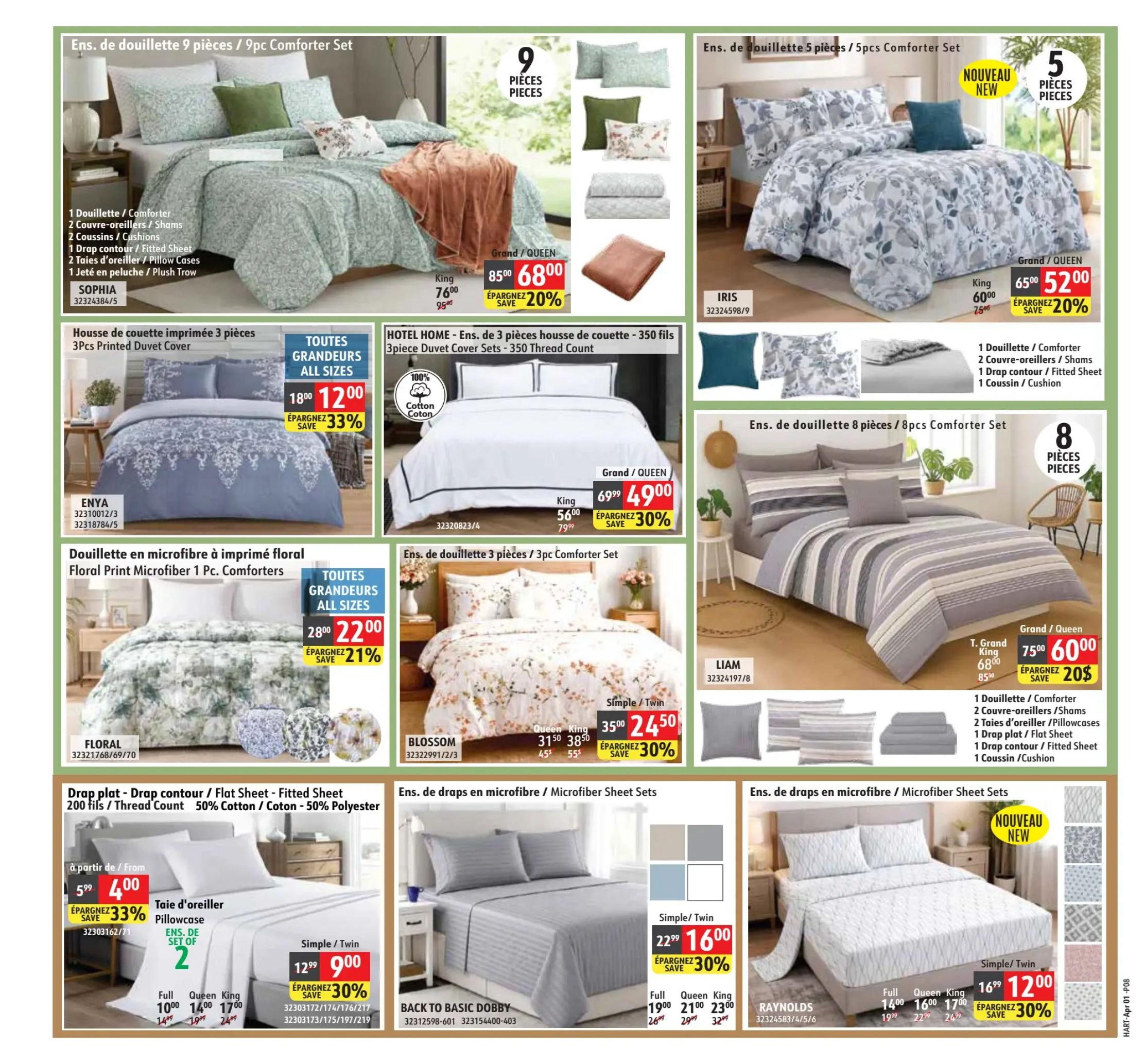 Hart flyer page 8 features a variety of bedding sets. The top left shows a 9-piece Sophia Comforter Set for Grand/Queen size at $68.00, down from $85.00, a 20% savings. Below that, a 3-piece ENYA Printed Duvet Cover Set is on sale for $12.00, down from $18.00 (33% off), available in all sizes. To the right, a new 5-piece IRIS Comforter Set is available for Grand/Queen size at $52.00, reduced from $65.00 (20% off). A HOTEL HOME 3-piece duvet cover set (350 thread count) is on sale for $49.00 for Grand/Queen, down from $69.99 (30% off). In the middle row, a Floral Print Microfiber 1-piece Comforter is $22.00, down from $28.00 (21% off), available in all sizes. The BLOSSOM 3-piece Comforter Set is $24.50 for Simple/Twin, down from $35.00 (30% off), and $38.50 for Queen/King, down from $45.00. A LIAM 8-piece Comforter Set is $60.00 for Grand/Queen, down from $75.00 (20% off). The bottom section highlights flat and fitted sheets: a 200 thread count, 50% cotton/50% polyester flat sheet starts at $4.00, down from $5.99 (33% off). Pillowcases are $9.00 for Simple/Twin, down from $12.99 (30% off), and also available for Full, Queen, and King sizes. Microfiber Sheet Sets are on sale for $16.00 for Simple/Twin, down from $22.99 (30% off), with Full, Queen, and King sizes also available. The RAYNOLDS Microfiber Sheet Set is $12.00 for Simple/Twin, down from $16.99 (30% off), with Full, Queen, and King sizes also featured.