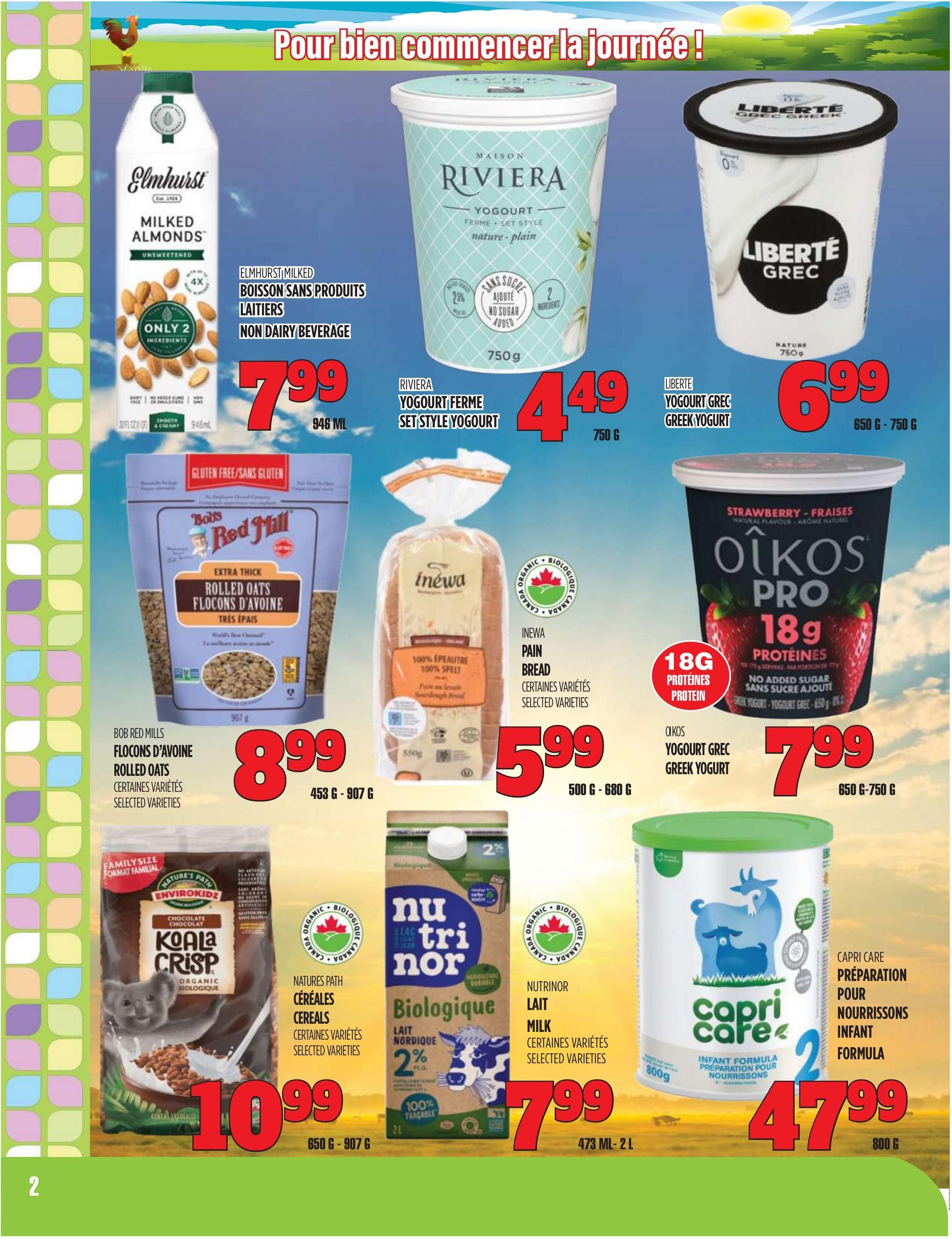 Marches TAU flyer page 2 features a selection of breakfast and dairy items. Elmhurst Milked Almonds unsweetened non-dairy beverage is $7.99 for 946 mL. Riviera Farm Set Style Yogurt (plain) is $4.49 for 750 g. Liberté Greek Yogurt is $6.99 for 650 g - 750 g. Bob Red Mills Rolled Oats (Extra Thick) are $8.99 for 453 g - 907 g. Inewa 100% Spelt Bread is $5.99 for 500 g - 680 g. Oikos Pro Greek Yogurt (Strawberry) with 18g protein is $7.99 for 650 g - 750 g. Nature's Path Envirokidz Koala Crisp Chocolate Cereal is $10.99 for 650 g - 907 g. Nutrinor Organic 2% Milk is $7.99 for 473 mL - 2 L. Capri Care Infant Formula is $47.99 for 800 g.