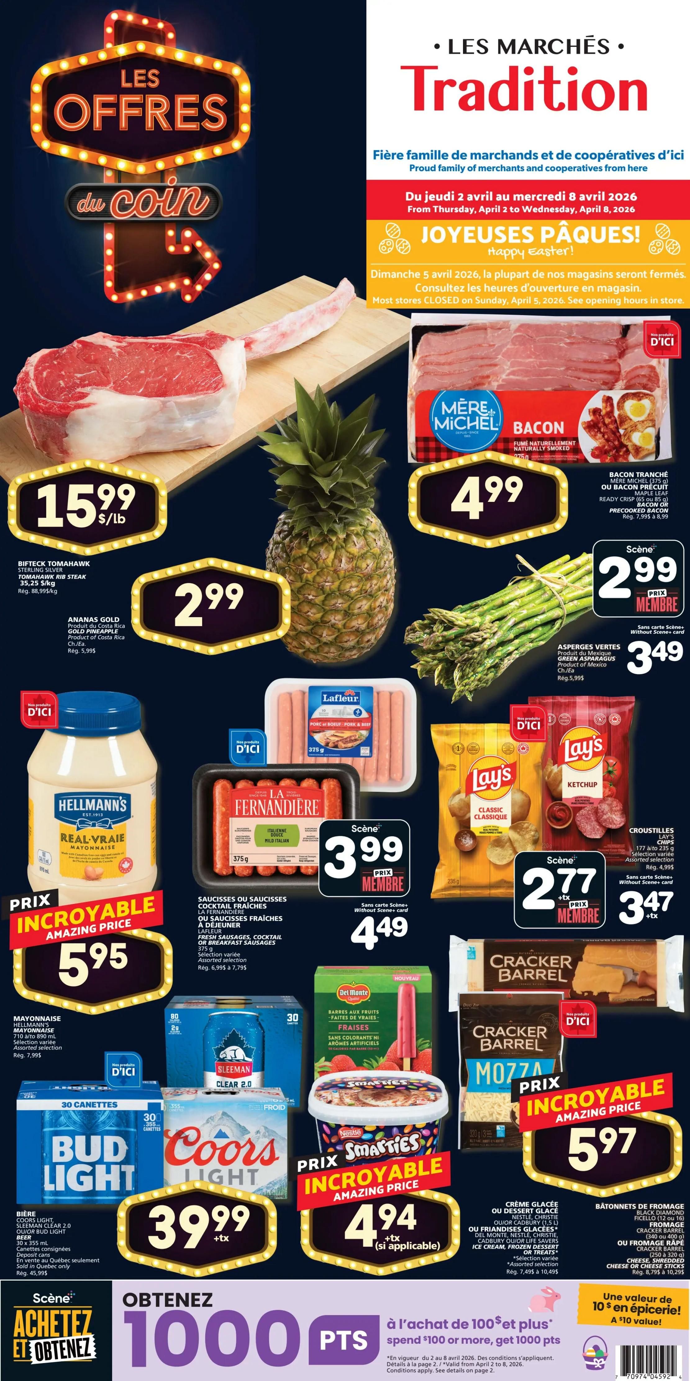 Marchés Tradition weekly flyer specials from April 2 to April 8, 2026. Featured items include BIFTECK TOMAHAWK STERLING SILVER beef rib steak for $15.99/lb, Gold pineapples for $2.99 each, and Mère Michel sliced bacon for $4.99. Also available are Lafleur pork and beef sausages or breakfast sausages for $3.99 (member price) or $4.49, Lay's Classic or Ketchup chips for $2.77 (member price) or $3.47, and Hellmann's Real Mayonnaise for $5.95. Green asparagus from Mexico is $2.99 (member price) or $3.49. Beverages on sale include Bud Light and Coors Light 24-can cases for $39.99 + tax. Nestlé Smarties ice cream is $4.94 + tax (if applicable). Del Monte fruit bars are also featured. Cracker Barrel Mozzarella or Cheddar cheese is $5.97. Get 1000 points when you spend $100 or more.