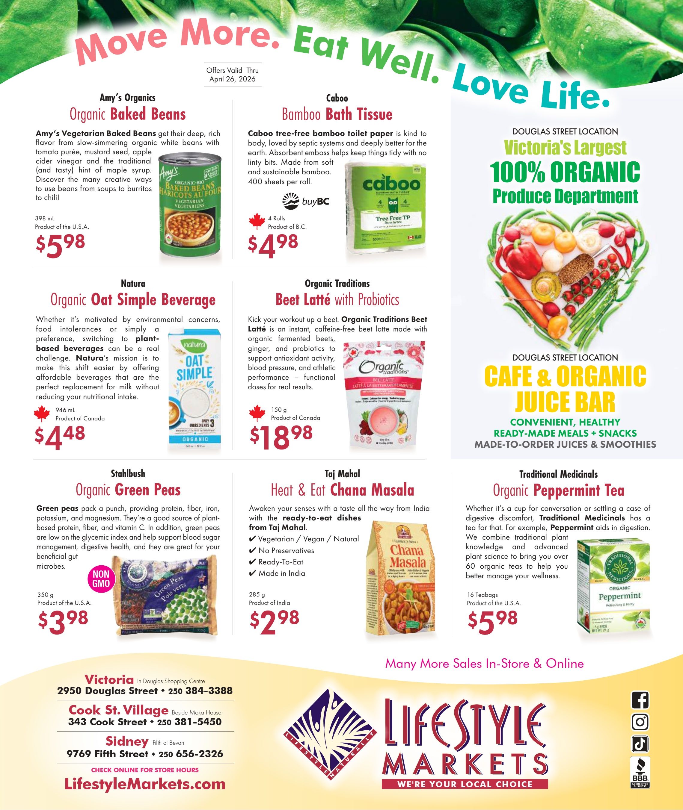 Lifestyle Markets flyer page 2 features a variety of organic products. Amy's Organics Organic Baked Beans are $5.98 for 398 mL. Caboo Bamboo Bath Tissue is $4.98 for 4 rolls, made from sustainable bamboo. Natura Organic Oat Simple Beverage is $4.48 for 946 mL, a plant-based option. Organic Traditions Beet Latté with Probiotics is $18.98 for 150 g, an instant caffeine-free beet latte. Stahlbush Organic Green Peas are $3.98 for 350 g, Non-GMO and a good source of protein and fiber. Taj Mahal Heat & Eat Chana Masala is $2.98 for 285 g, a vegetarian, vegan, natural, ready-to-eat dish made in India. Traditional Medicinals Organic Peppermint Tea is $5.98 for 16 teabags, known to aid digestion. The Douglas Street Location highlights their 'Victoria's Largest 100% Organic Produce Department' and 'Cafe & Organic Juice Bar' offering convenient, healthy ready-made meals, snacks, and made-to-order juices and smoothies. The flyer also lists store locations and contact information for Victoria, Cook Street Village, and Sidney, along with the website LifestyleMarkets.com. Offers valid through April 26, 2026.