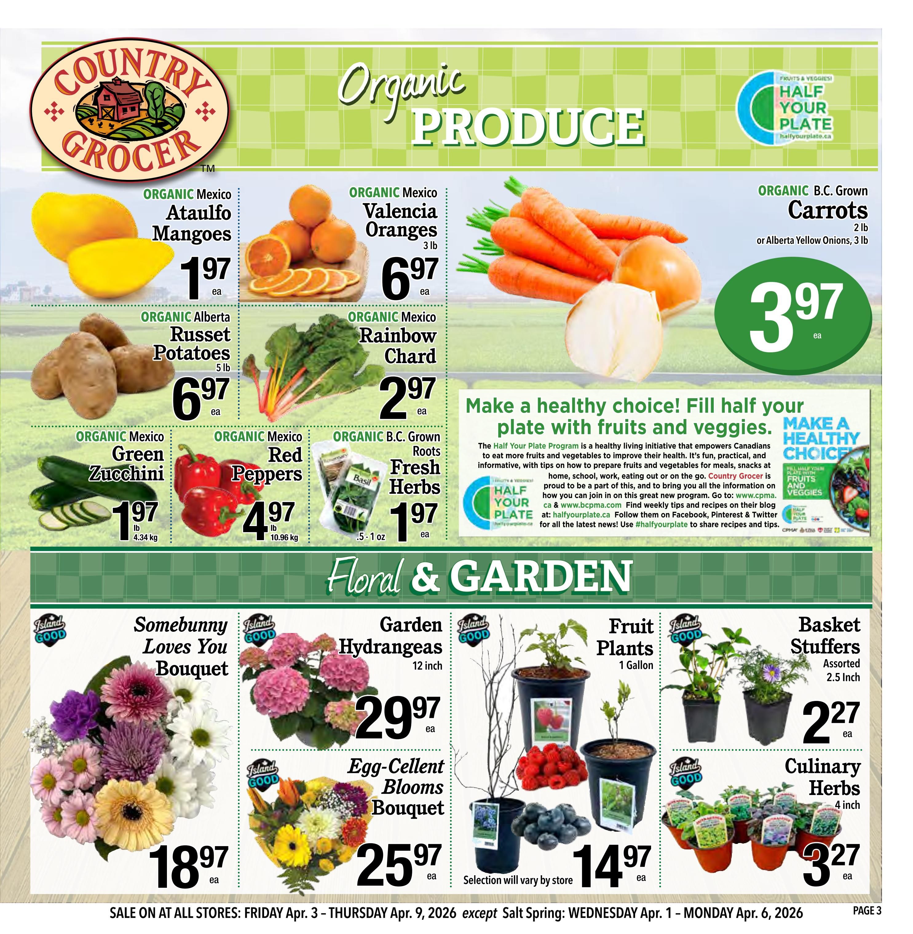 Country Grocer weekly flyer specials page 3 features organic produce and floral & garden items. Organic Mexico Ataulfo Mangoes are $1.97 each. Organic Mexico Valencia Oranges, 3 lb bag, are $6.97 each. Organic B.C. Grown Carrots, 2 lb bag, or Alberta Yellow Onions, 3 lb bag, are $3.97 each. Organic Alberta Russet Potatoes, 5 lb bag, are $6.97 each. Organic Mexico Rainbow Chard is $2.97 each. Organic Mexico Green Zucchini, 4.34 kg, is $1.97 lb. Organic Mexico Red Peppers, 10.96 kg, are $4.97 lb. Organic B.C. Grown Roots Fresh Herbs, 5-1 oz, are $1.97 each. The page also highlights the 'Half Your Plate' program promoting healthy eating. In the Floral & Garden section, 'Somebunny Loves You' Bouquet is $18.97 each. Garden Hydrangeas, 12 inch, are $29.97 each. Egg-Cellent Blooms Bouquet is $25.97 each. Fruit Plants, 1 Gallon, are $14.97 each. Basket Stuffers, assorted 2.5 inch, are $2.27 each. Culinary Herbs, 4 inch, are $3.27 each. Sale runs from Friday, April 3 to Thursday, April 9, 2026, with exceptions for Salt Spring.