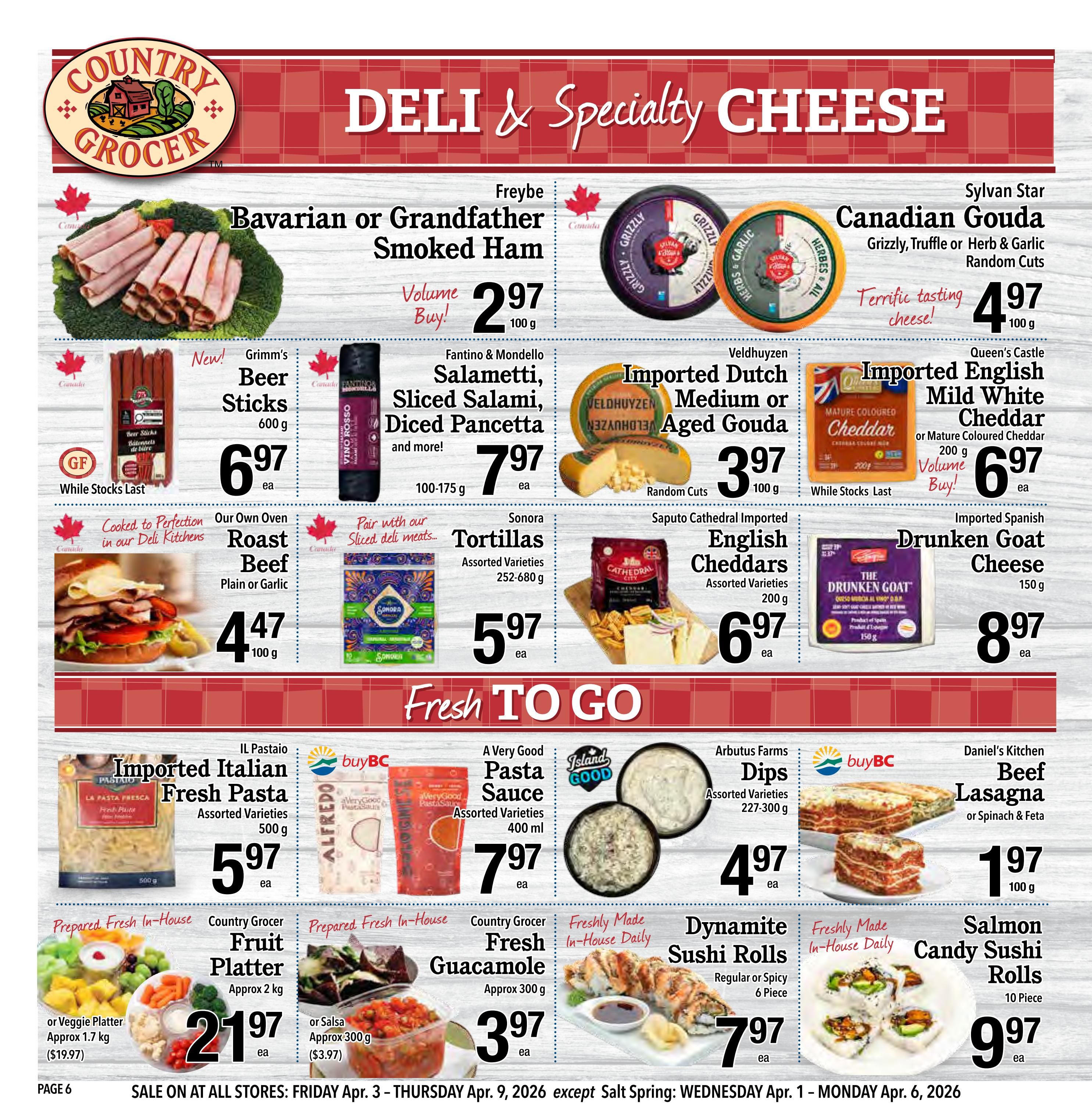 Country Grocer weekly flyer specials page 6 features deli and specialty cheese. Offers include Freybe Bavarian or Grandfather Smoked Ham for $2.97 per 100g, Grimm's Beer Sticks for $6.97 each, Fantino & Mondello Salamietti, Sliced Salami, Diced Pancetta for $7.97 per 100-175g, and Our Own Oven Roast Beef (Plain or Garlic) for $4.47 per 100g. Specialty cheeses include Sylvan Star Canadian Gouda (Grizzly, Truffle or Herb & Garlic Random Cuts) for $4.97 per 100g, Veldhuyzen Imported Dutch Medium or Aged Gouda for $3.97 per 100g, Queen's Castle Imported English Mild White Cheddar or Mature Coloured Cheddar for $6.97 per 200g, Saputo Cathedral Imported English Cheddars (Assorted Varieties) for $6.97 per 200g, and Imported Spanish Drunken Goat Cheese for $8.97 per 150g. Sonora Tortillas (Assorted Varieties) are $5.97 per 252-680g. The 'Fresh To Go' section includes IL Pastaio Imported Italian Fresh Pasta (Assorted Varieties) for $5.97 per 500g, A Very Good Pasta Sauce (Assorted Varieties) for $7.97 per 400ml, Arbutus Farms Dips (Assorted Varieties) for $4.97 per 227-300g, and Daniel's Kitchen Beef Lasagna or Spinach & Feta for $1.97 per 100g. Prepared fresh in-house items include Country Grocer Fruit Platter (Approx 2kg) for $21.97 each, or Veggie Platter (Approx 1.7kg) for $19.97, Fresh Guacamole (Approx 300g) for $3.97 each, Dynamite Sushi Rolls (Regular or Spicy, 6 Piece) for $7.97 each, and Salmon Candy Sushi Rolls (10 Piece) for $9.97 each.