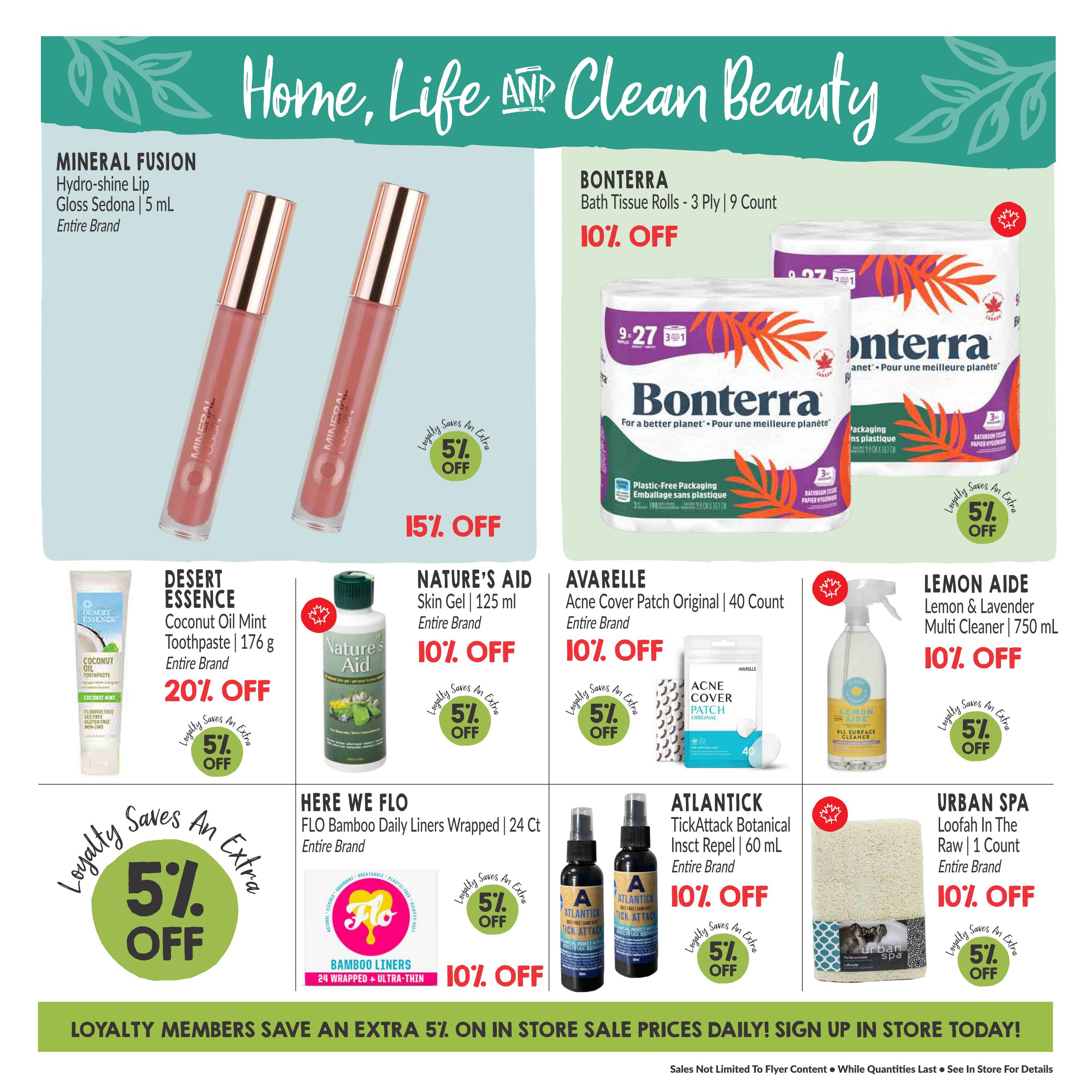 Goodness Me! flyer page featuring 'Home, Life AND Clean Beauty' products. Offers include Mineral Fusion Hydro-shine Lip Gloss in Sedona for 15% off. Desert Essence Coconut Oil Mint Toothpaste (176 g) is 20% off. Nature's Aid Skin Gel (125 ml) and Avarelle Acne Cover Patch (40 count) are each 10% off. Bonterra Bath Tissue Rolls (3-ply, 9 count) are 10% off. Lemon Aide Lemon & Lavender Multi Cleaner (750 mL) is 10% off. Here We Flo FLO Bamboo Daily Liners (24 count) are 10% off. Atlantick TickAttack Botanical Insect Repel (60 mL) is 10% off. Urban Spa Loofah In The Raw (1 count) is 10% off. All items also offer an additional 5% off for loyalty members, with a banner stating 'Loyalty Members Save an Extra 5% On In Store Sale Prices Daily! Sign Up In Store Today!'