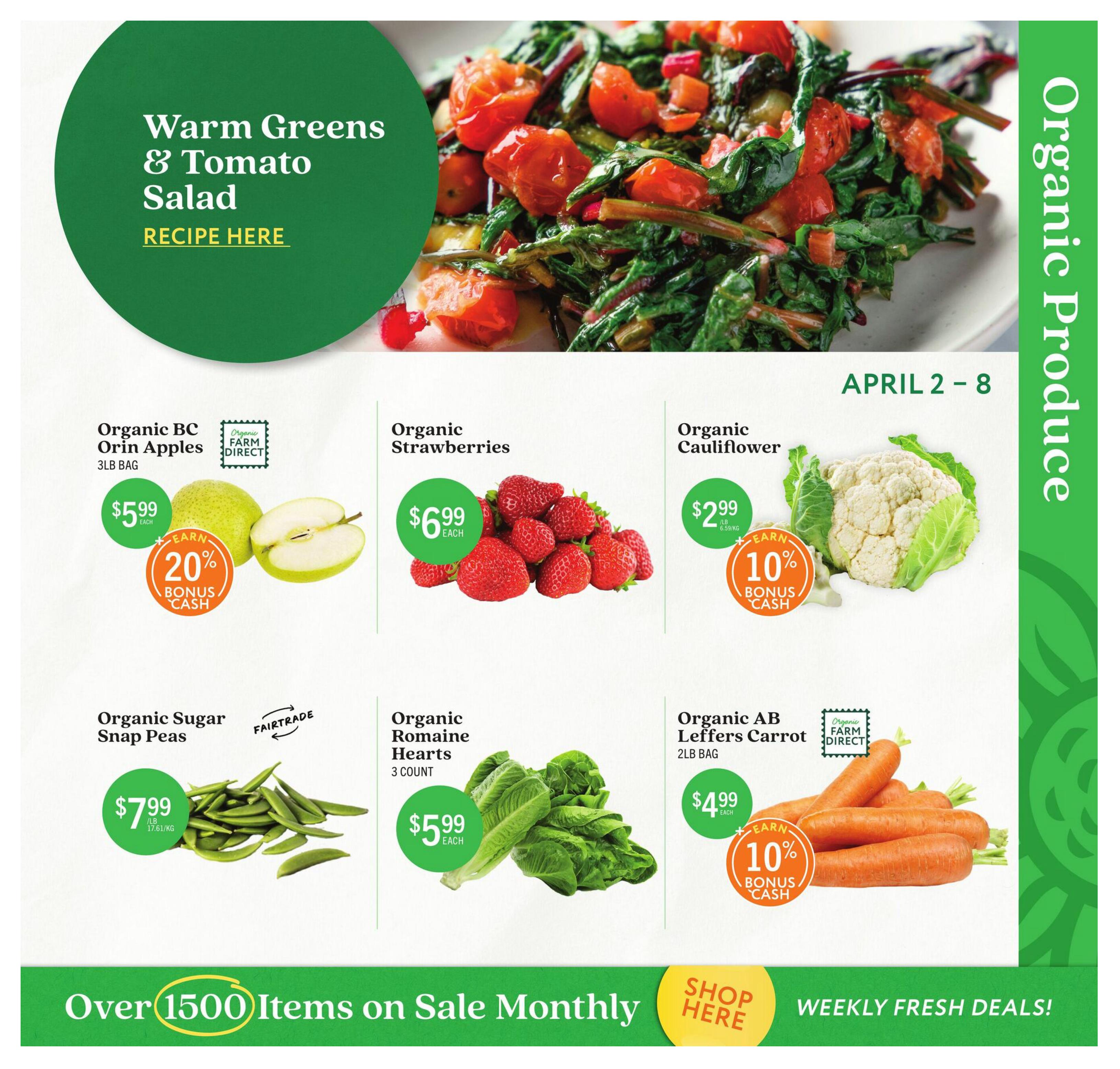 Community Natural Foods flyer, page 2, featuring organic produce on sale from April 2-8. Highlights include Organic BC Orin Apples, 3lb bag, for $5.99 with a 20% bonus cash offer. Organic Strawberries are $6.99 each. Organic Cauliflower is $2.99/lb with a 10% bonus cash offer. Organic Sugar Snap Peas are $7.99/lb and Fairtrade certified. Organic Romaine Hearts (3 count) are $5.99 each. Organic AB Leffers Carrots, 2lb bag, are $4.99 each with a 10% bonus cash offer. The page also features a recipe for Warm Greens & Tomato Salad and promotes 'Over 1500 Items on Sale Monthly' and 'Weekly Fresh Deals!