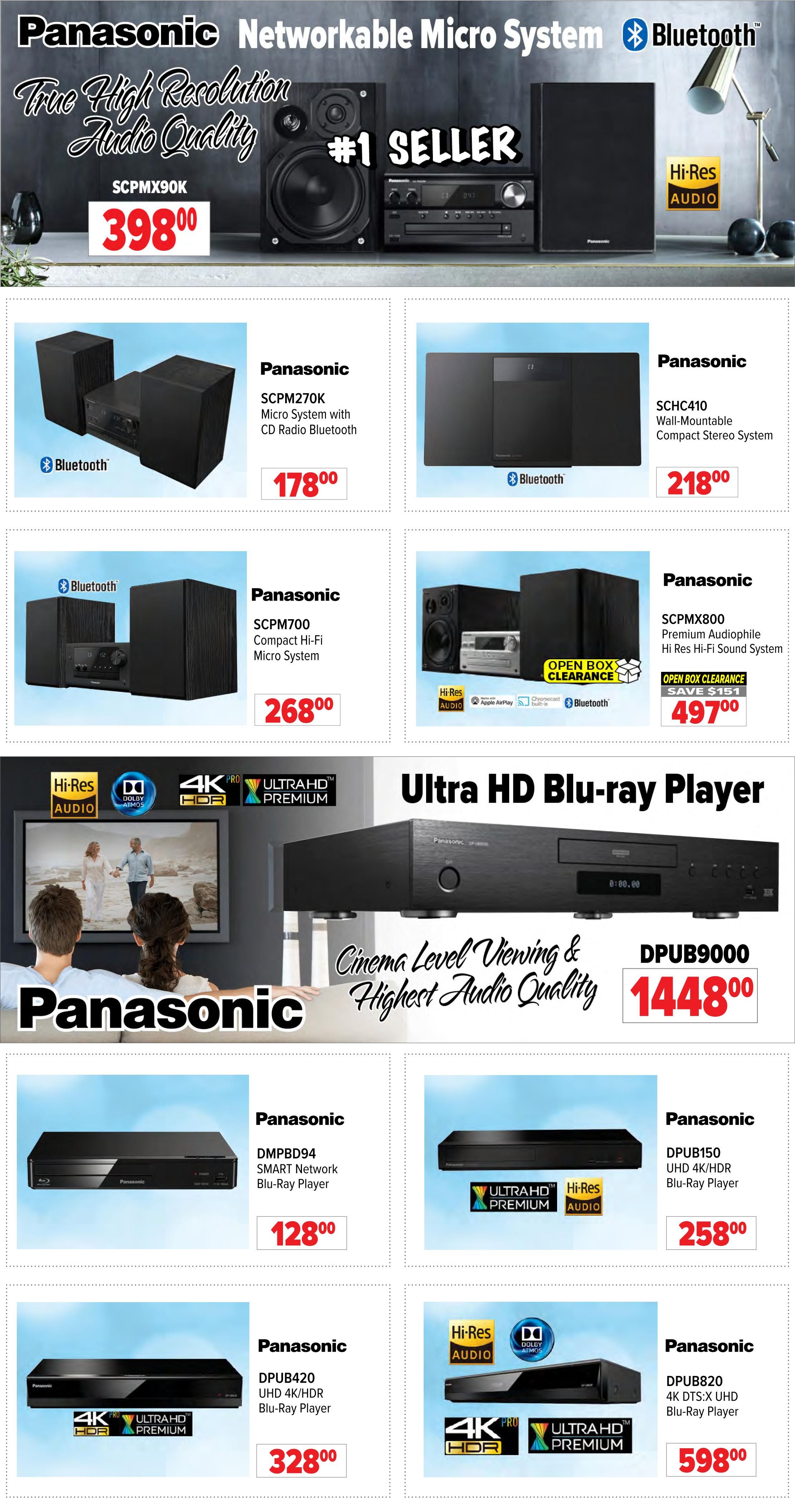 2001 Audio Video weekly flyer specials page 14 features Panasonic audio and video systems. Top featured item is a Panasonic Networkable Micro System, #1 Seller, for $398.00. Other Panasonic micro systems include the SCPM270K Micro System with CD Radio Bluetooth for $178.00, the SCPM700 Compact Hi-Fi Micro System for $268.00, and an Open Box Clearance SCPMX800 Premium Audiophile Hi-Res Hi-Fi Sound System for $497.00, saving $151. Also shown is the SCHC410 Wall-Mountable Compact Stereo System for $218.00. The page highlights Panasonic Ultra HD Blu-ray Players, including the DPUB9000 for $1448.00, the DMPBD94 SMART Network Blu-Ray Player for $128.00, the DPUB150 UHD 4K/HDR Blu-Ray Player for $258.00, the DPUB420 UHD 4K/HDR Blu-Ray Player for $328.00, and the DPUB820 4K DTS:X UHD Blu-Ray Player for $598.00. Many players feature Hi-Res Audio, Dolby Atmos, 4K HDR, and Ultra HD Premium technology.