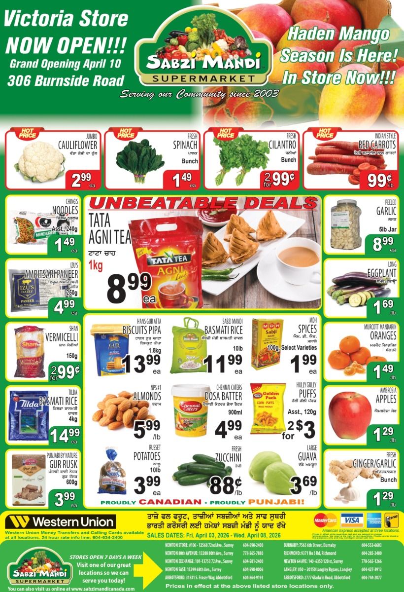 Sabzi Mandi Supermarket flyer. The top banner announces the Victoria Store NOW OPEN!!! Grand Opening April 10 at 306 Burnside Road. Another banner states 'Haden Mango Season Is Here! In Store Now!!!'. Featured 'Hot Price' items include Cauliflower for $2.99 each, Fresh Spinach bunches for $1.49 each, Fresh Cilantro bunches for $2.99, and Indian Style Red Carrots for 99 cents per lb. The 'Unbeatable Deals' section presents Ching's Noodles (Assorted, 240g) for $1.49 each, Tata Agni Tea (1kg) for $8.99 each, Izus Dairy Amritsari Paneer (250g) for $4.99 each, Peeled Garlic (5lb Jar) for $8.99 each, and Long Eggplant for $1.69 per lb. Other specials include Shan Vermicelli (150g) for $2.99 each, Hans Gur Atta Biscuits Pipa (1.8kg) for $13.99 each, Sabzi Mandi Basmati Rice (10lb) for $11.99 each, Moh Sabji Spices (100g, Select Varieties) for $1.99 each, and Murcott Mandarin Oranges for $1.49 per lb. Further offers include Tilda Basmati Rice (4kg) for $14.99 each, NPS #1 Almonds for $5.99 per lb, Chennai Caters Dosa Batter (900ml) for $4.99 each, Golden Pack Hully Gully Puffs (Assorted, 120g) 2 for $3, Ambrosia Apples for $1.29 per lb, Punjabi By Nature Gur Rusk (600g) for $3.99 each, Russet Potatoes (10lb) for $3.99 each, Fresh Zucchini for 88 cents per lb, Large Guava for $3.69 per lb, and Fresh Ginger/Garlic bunches for $1.29 each. The flyer also features Western Union money transfers and calling cards, and states 'Proudly Punjabi!'. Sales dates are Friday, April 03, 2026 to Wednesday, April 08, 2026. Store locations and contact information are listed at the bottom.