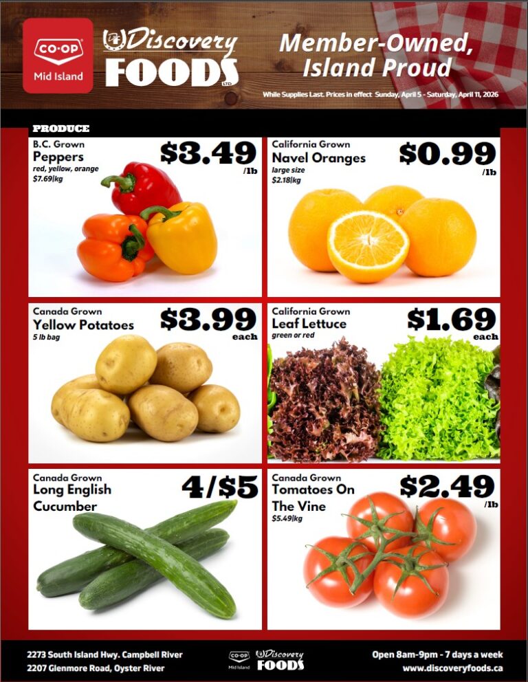 Discovery Foods weekly flyer specials page 2, featuring produce. B.C. Grown Peppers (red, yellow, orange) are $3.49/lb. California Grown Navel Oranges are $0.99/lb. Canada Grown Yellow Potatoes are $3.99 each for a 5 lb bag. California Grown Leaf Lettuce (green or red) is $1.69 each. Canada Grown Long English Cucumbers are 4 for $5. Canada Grown Tomatoes On The Vine are $2.49/lb. Prices are valid Sunday, April 5 to Saturday, April 11, 2026.