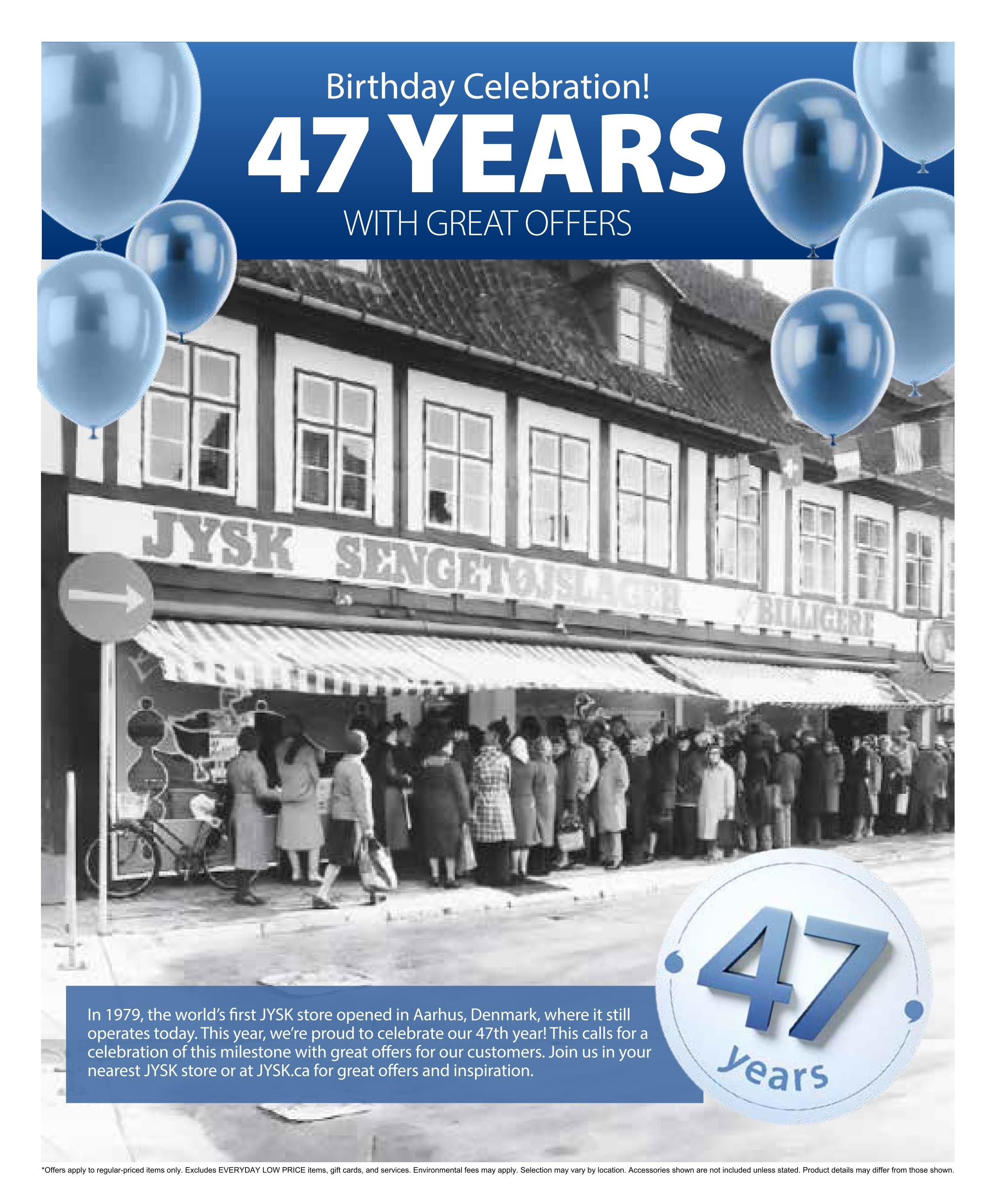 Jysk flyer page celebrating 47 years with great offers. The page features a historical black and white image of the first Jysk store in Aarhus, Denmark, with a crowd outside. Blue balloons float above the image. Text reads 'Birthday Celebration! 47 YEARS WITH GREAT OFFERS'. A blue banner at the bottom states that the first Jysk store opened in 1979 and invites customers to join the 47th-anniversary celebration with great offers at their nearest Jysk store or at Jysk.ca. Small print at the bottom notes that offers apply to regular-priced items only, excludes Everyday Low Price items, gift cards, and services, and that selection may vary by location. Accessories shown are not included unless stated.