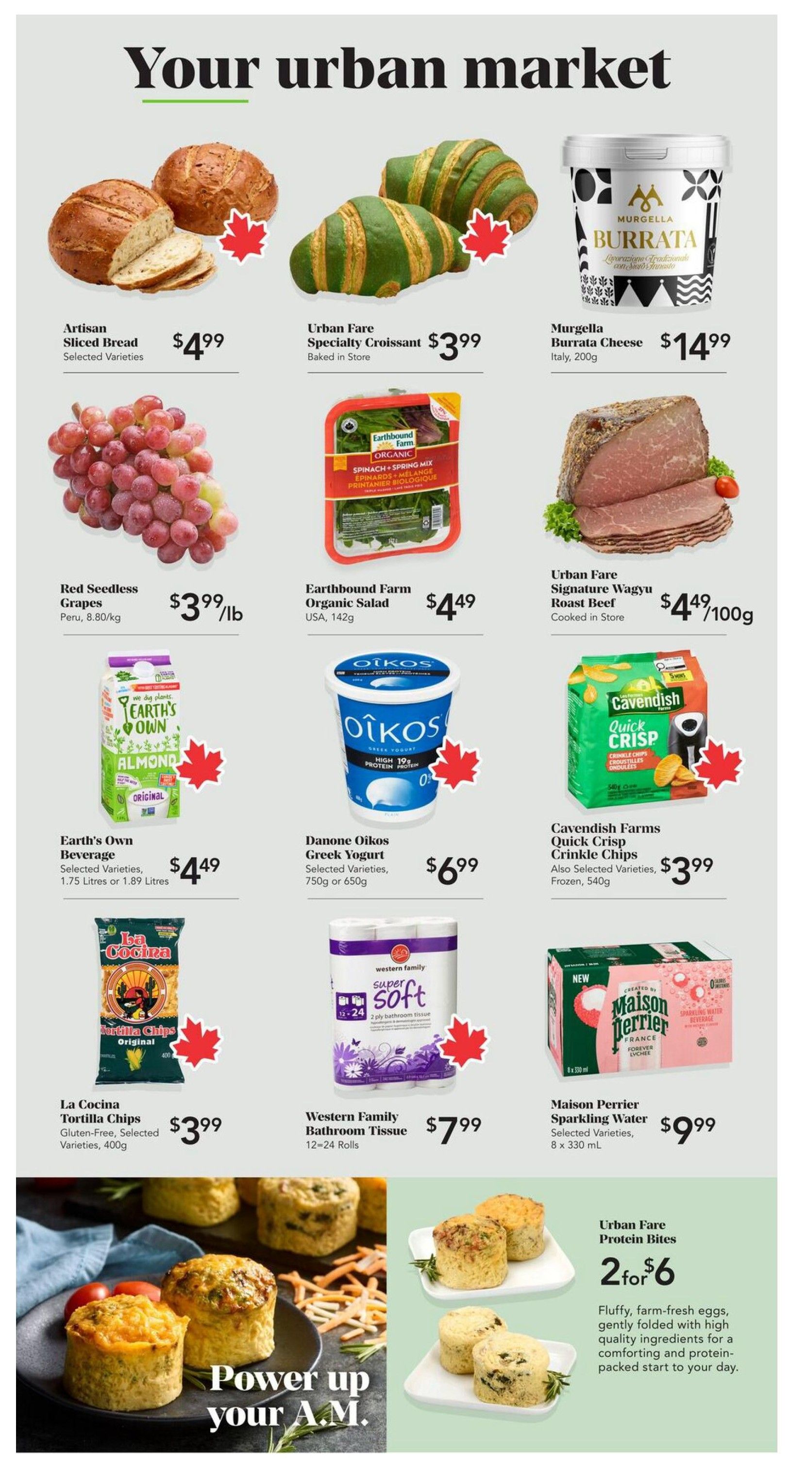 Urban Fare weekly flyer specials page 2. Featured items include Artisan Sliced Bread for $4.99, Urban Fare Specialty Croissants for $3.99, and Murgella Burrata Cheese for $14.99. Also available are Red Seedless Grapes from Peru for $3.99/lb, Earthbound Farm Organic Salad for $4.49, and Urban Fare Signature Wagyu Roast Beef cooked in store for $4.49/100g. Other deals include Earth's Own Beverage (Selected Varieties, 1.75 or 1.89 Litres) for $4.49, Danone Oikos Greek Yogurt (Selected Varieties, 750g or 650g) for $6.99, and Cavendish Farms Quick Crisp Crinkle Chips (Frozen, 540g) for $3.99. Additionally, La Cocina Tortilla Chips (Gluten-Free, Selected Varieties, 400g) are $3.99, Western Family Bathroom Tissue (12-24 Rolls) is $7.99, and Maison Perrier Sparkling Water (8 x 330 mL) is $9.99. The page also highlights 'Power up your A.M.' with Urban Fare Protein Bites, offering 2 for $6. These bites are described as fluffy, farm-fresh eggs gently folded with high-quality ingredients for a comforting and protein-packed start to your day.