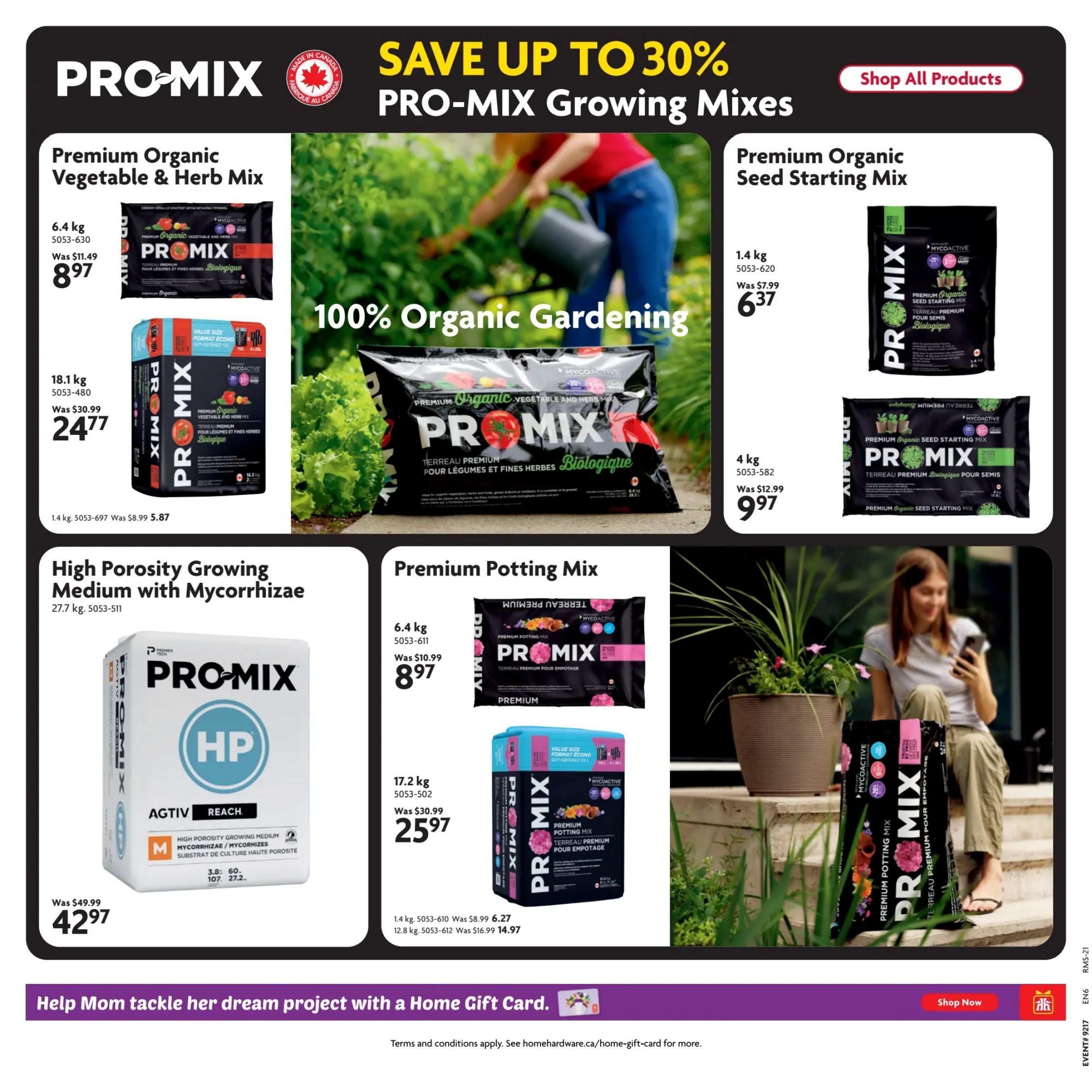Home Hardware flyer page 21 features PRO-MIX Growing Mixes with savings up to 30%. Offers include Premium Organic Vegetable & Herb Mix in 6.4 kg for $8.97 (was $11.49) and 18.1 kg for $24.77 (was $30.99). Also available is 1.4 kg of PRO-MIX Premium Organic Vegetable & Herb Mix for $5.87. Premium Organic Seed Starting Mix is on sale: 1.4 kg for $6.37 (was $7.99) and 4 kg for $9.97 (was $12.99). High Porosity Growing Medium with Mycorrhizae (27.7 kg) is priced at $42.97 (was $49.99). Premium Potting Mix is available in 6.4 kg for $8.97 (was $10.99) and 17.2 kg for $25.97 (was $30.99). Additionally, a 1.4 kg size is $6.27 and a 12.8 kg size is $14.97. The page also promotes '100% Organic Gardening' and a 'Shop All Products' button. A banner at the bottom reads 'Help Mom tackle her dream project with a Home Gift Card.' and includes a 'Shop Now' button.