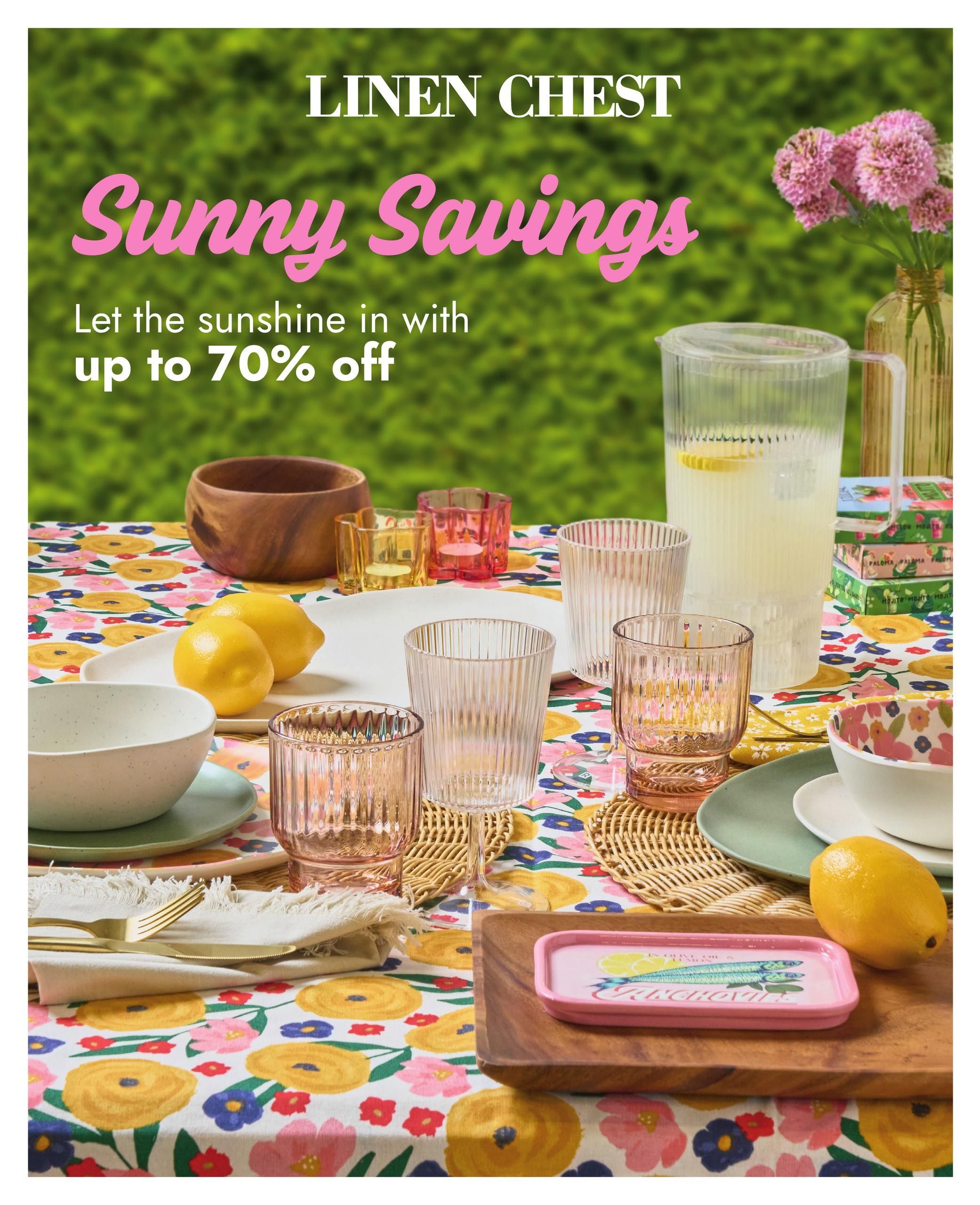 Linen Chest flyer featuring 'Sunny Savings' with up to 70% off. The page displays a table setting with a floral tablecloth, a wooden bowl, lemons, glassware, a pitcher of lemonade, and a small pink dish with anchovy illustrations. The sale runs from April 22 to May 24, 2026.