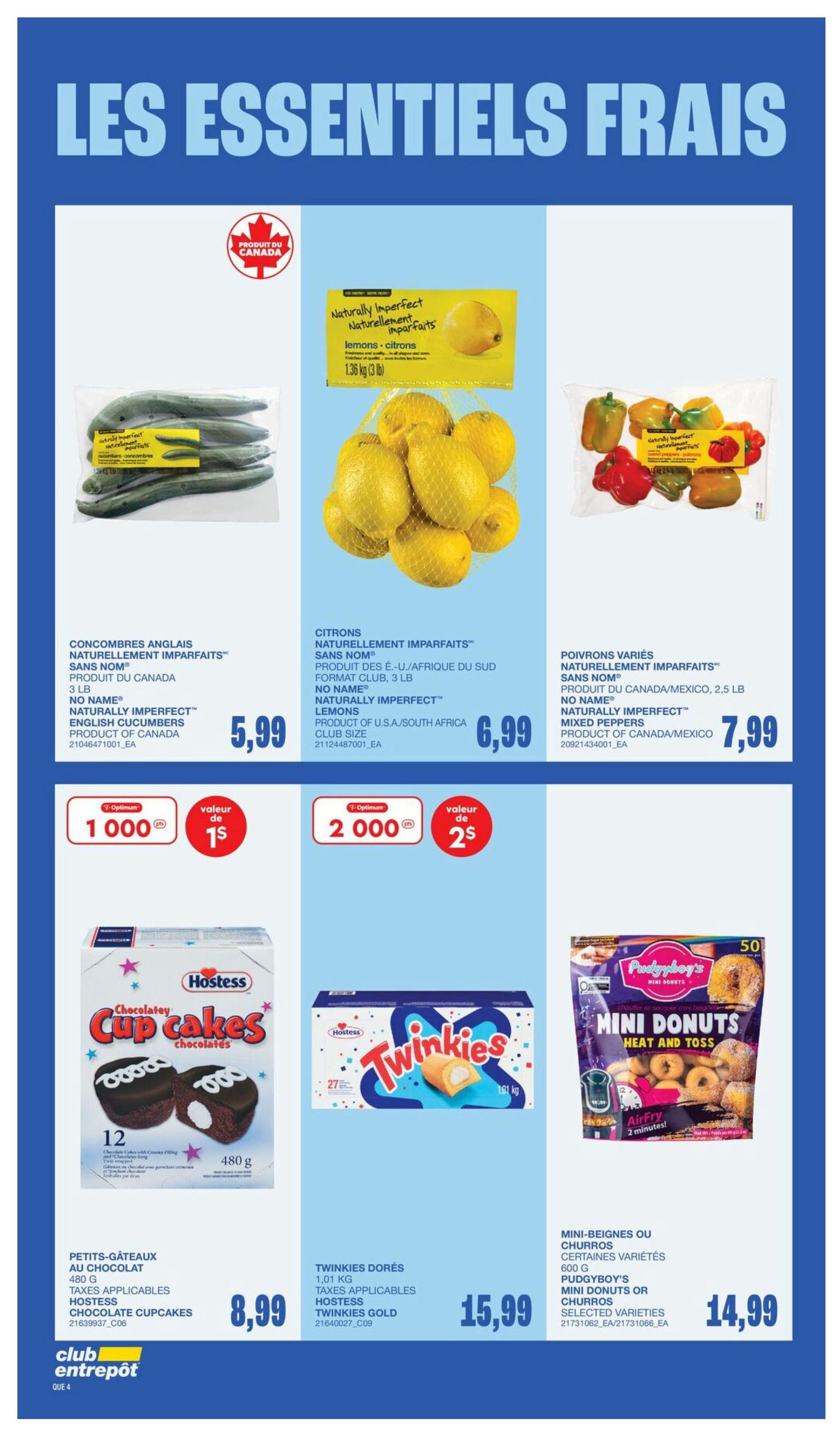 Wholesale Club flyer page featuring fresh essentials. Products include Naturally Imperfect English Cucumbers for $5.99, Naturally Imperfect Lemons (3 lb) for $6.99, and Naturally Imperfect Mixed Peppers (2.5 lb) for $7.99. Also available are Hostess Chocolate Cupcakes (12 count, 480g) for $8.99, Hostess Twinkies Gold (1.01 kg) for $15.99, and Pudgyboy's Mini Donuts or Churros (600g, selected varieties) for $14.99. There are Optimum offers for 1000 points to get $1 off and 2000 points to get $2 off.